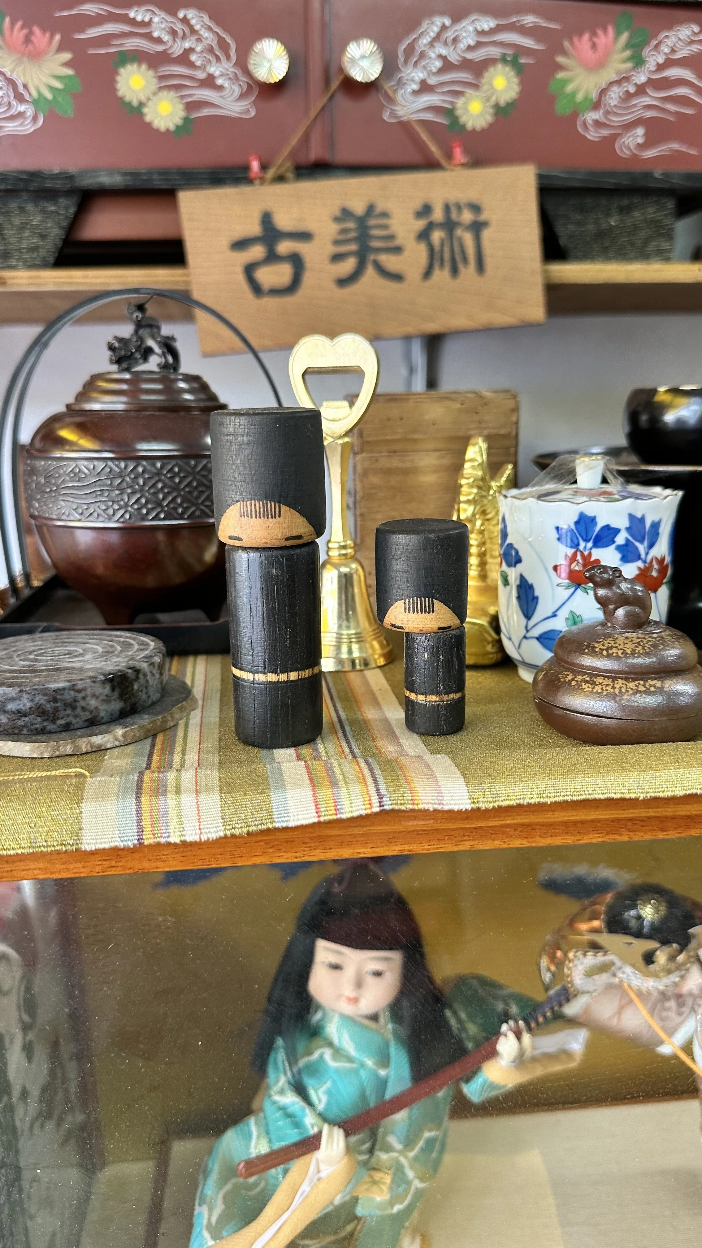 Vintage Kokeshi dolls and Japanese ceramics at Toji Temple market