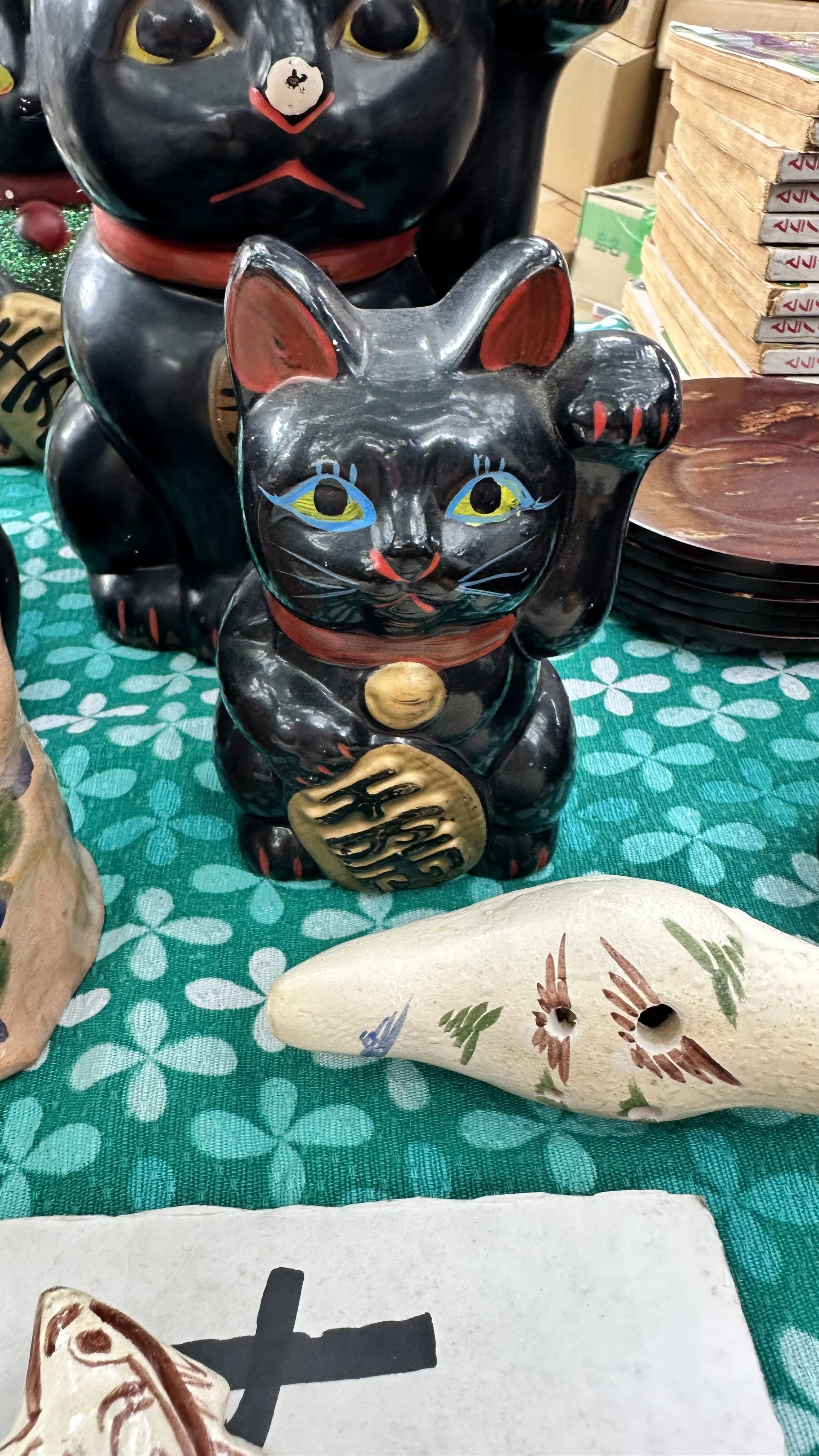 Pair of black vintage maneki neko lucky cat statues