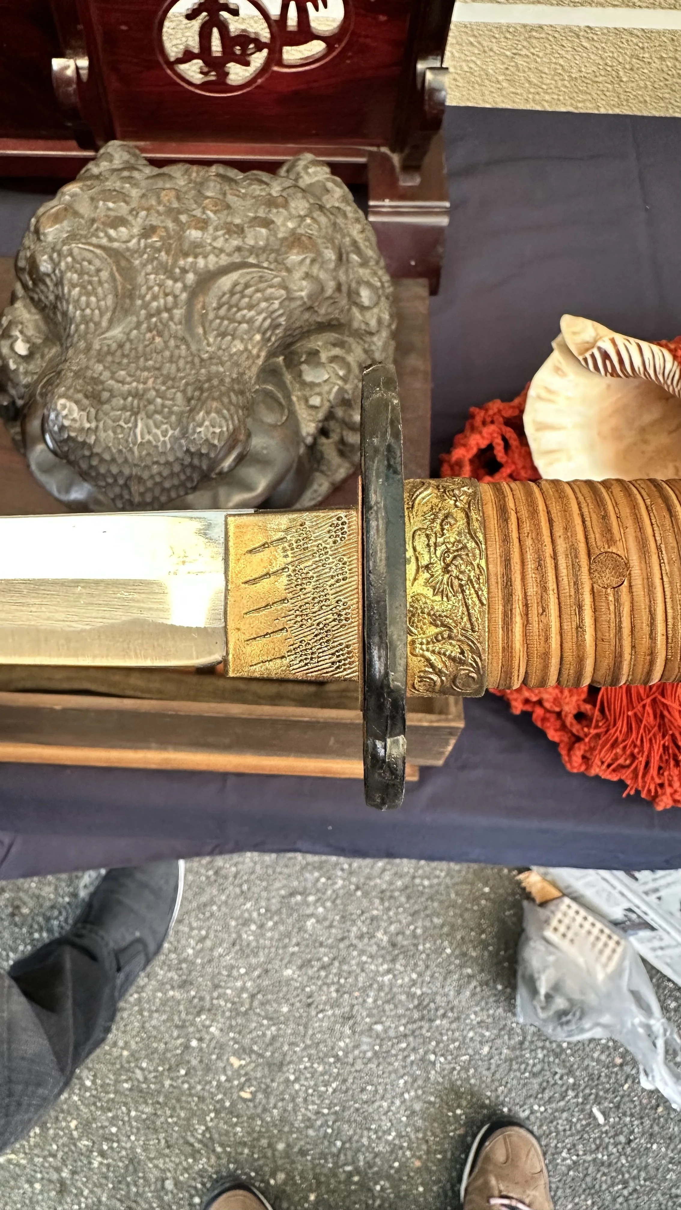 Detail of a vintage Japanese katana sword handle and tsuba