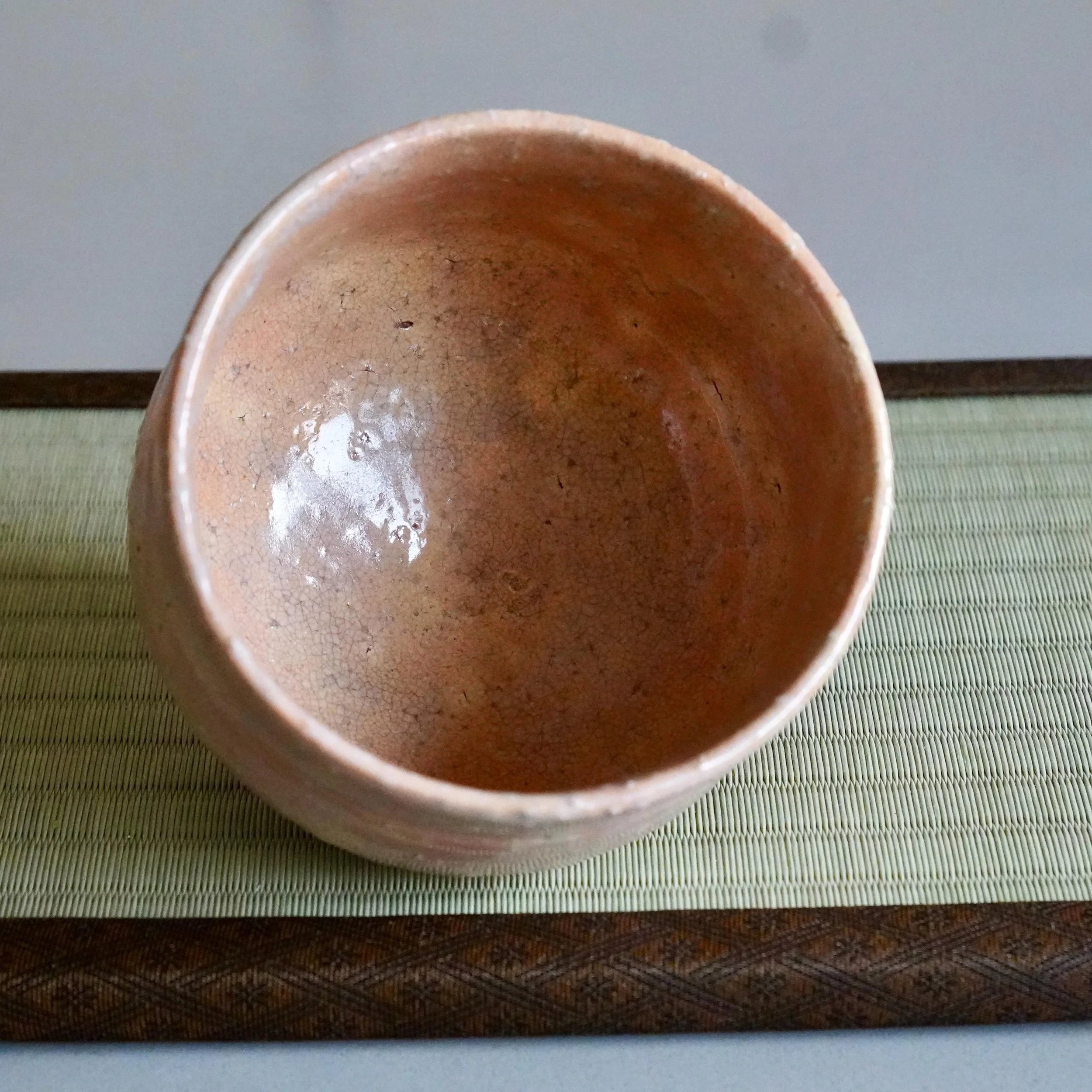 Hagi chawan Yamato Matsuroku-gama interior top-down view, pale shira-Hagi glaze pooling toward center