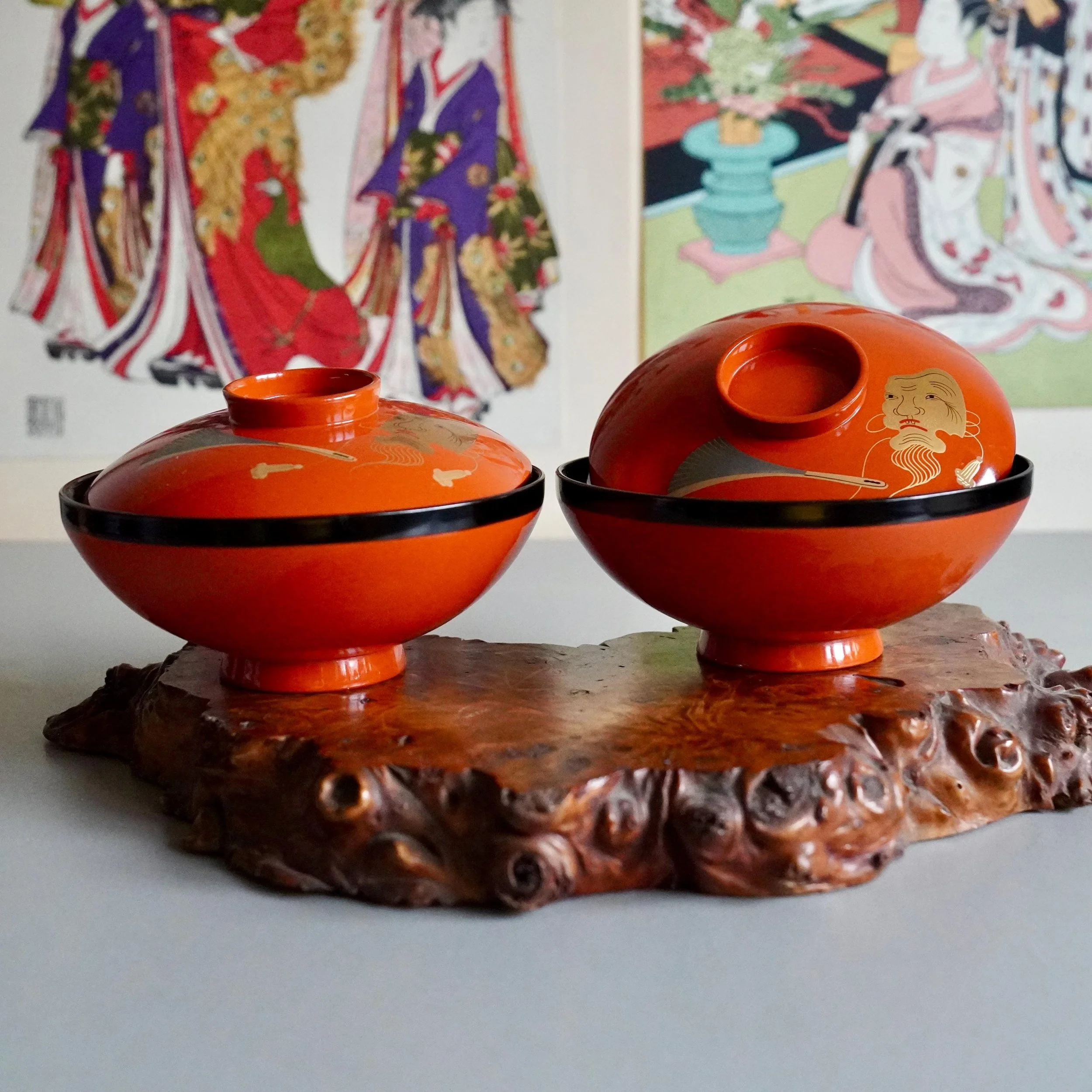 Pair of covered urushi lacquer owan bowls on wooden burl stand, Japan