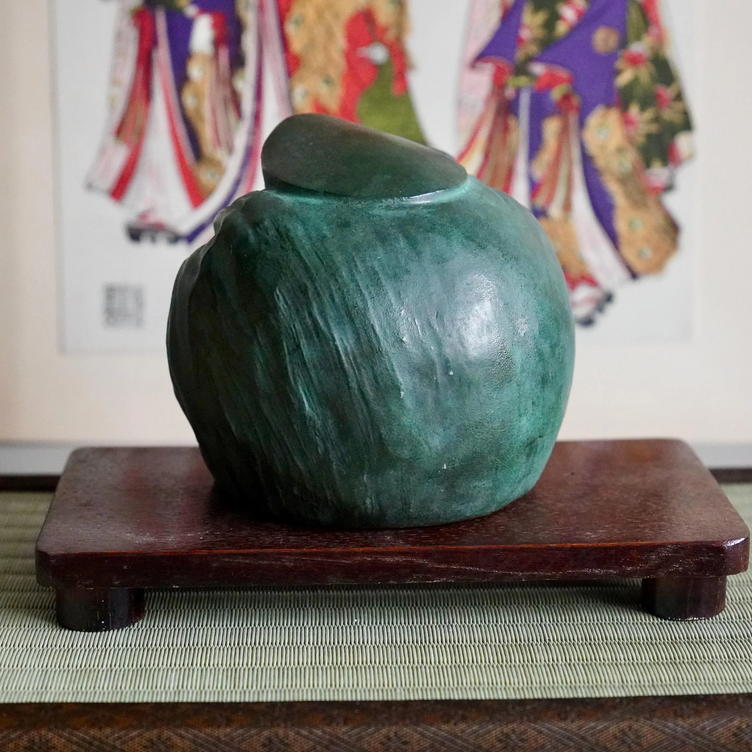 Rear view bronze Daikokuten Seven Lucky Gods statue showing rounded back and flat cap detail, deep green bronze patina, Showa period Japan Rij 2