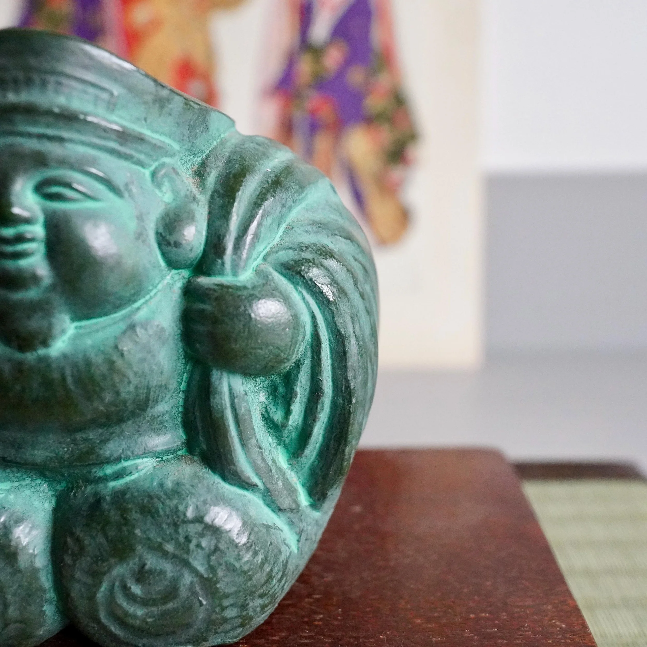 Side profile Japanese bronze Daikokuten showing characteristic flat black cap detail, green aged patina, okimono signed Shuho 秀峰作 late Showa period Japan