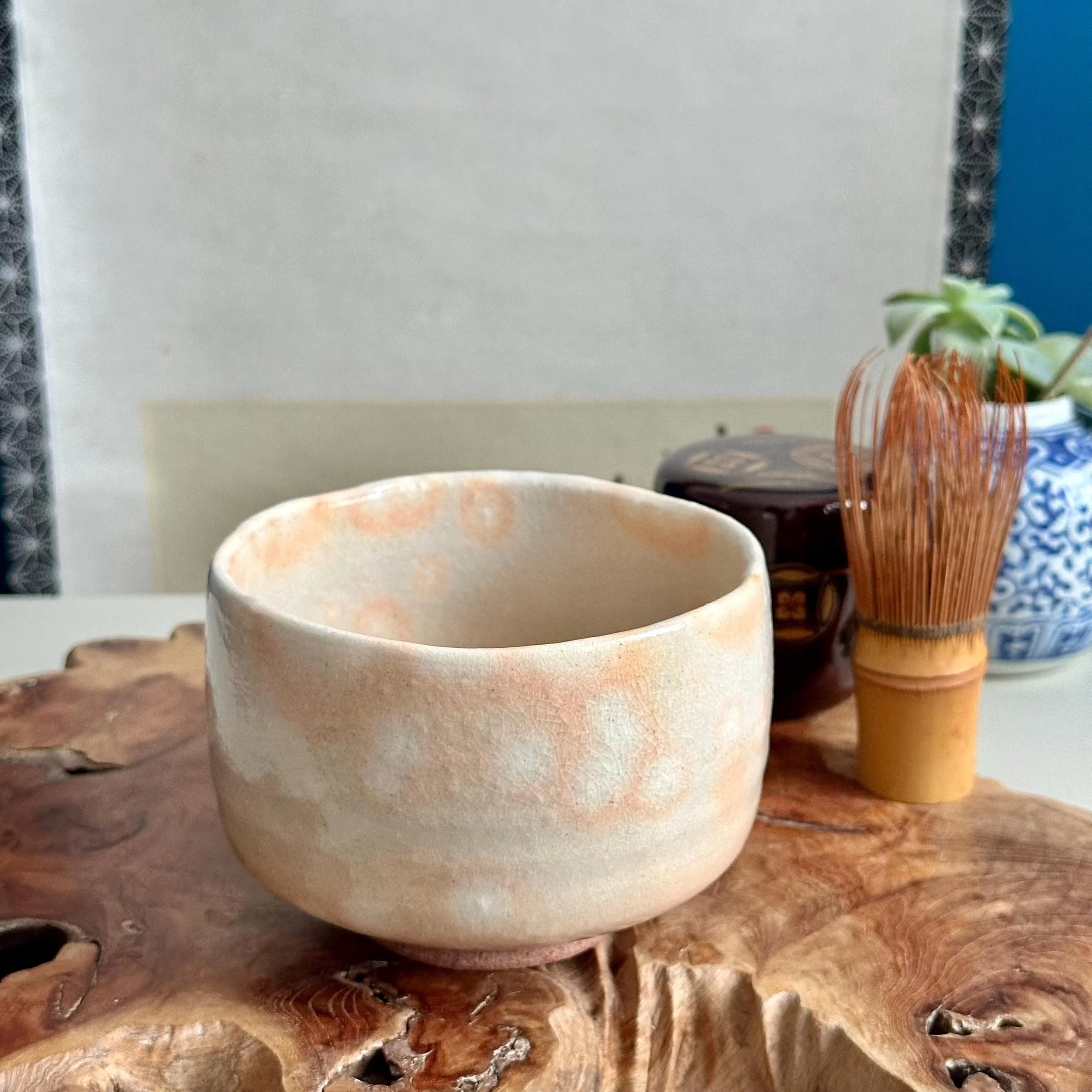 Hagi-yaki matcha bowl, front angle, fine kannyu crackle visible in the glaze