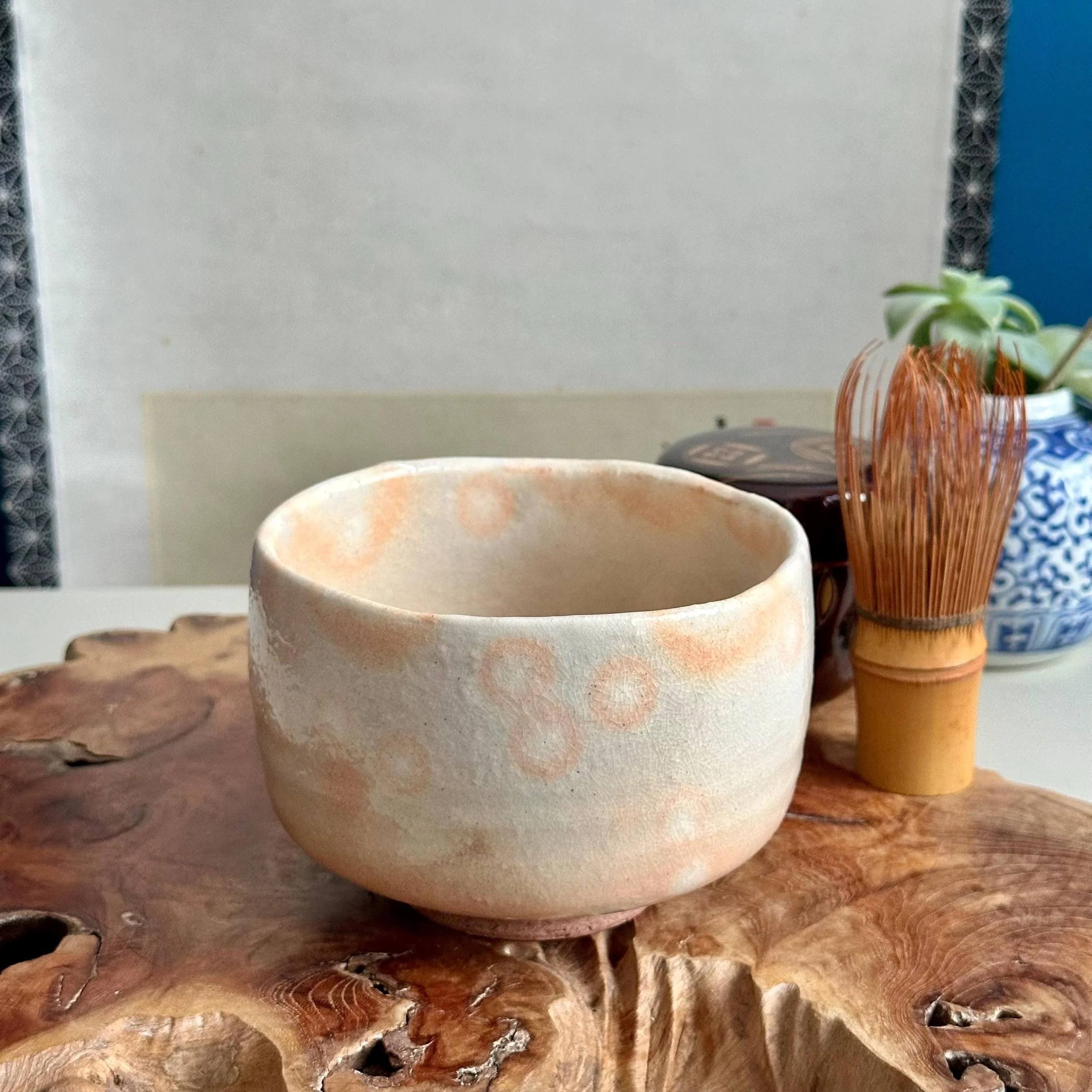 Hagi-yaki gohonde chawan on burl wood board, Shōwa period Japanese tea bowl