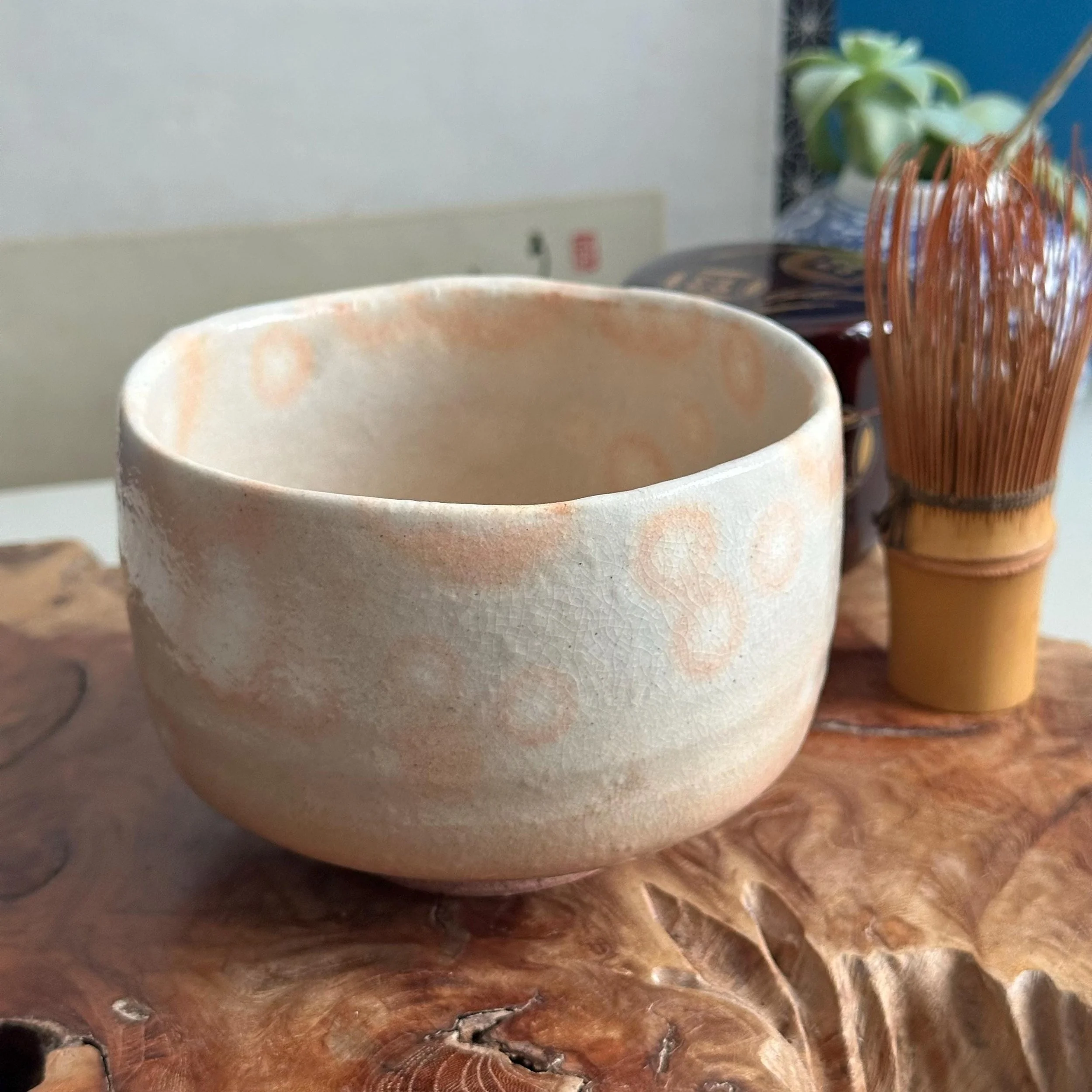 Hagi-yaki gohonde matcha bowl, close front angle showing glaze texture