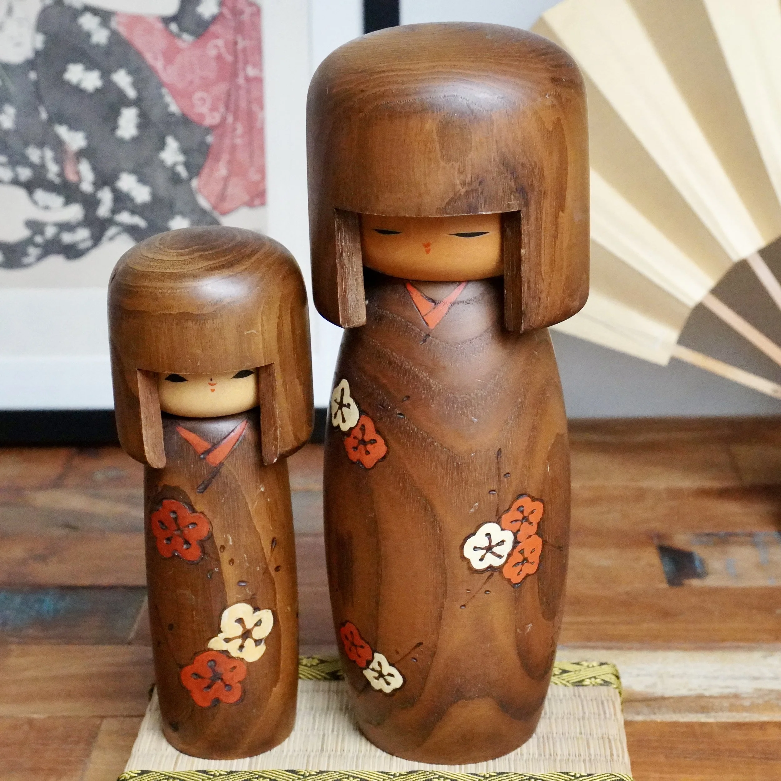 Sōsaku kokeshi pair with ume plum blossom, natural wood hair, Usaburo studio by Yuji Okamoto
