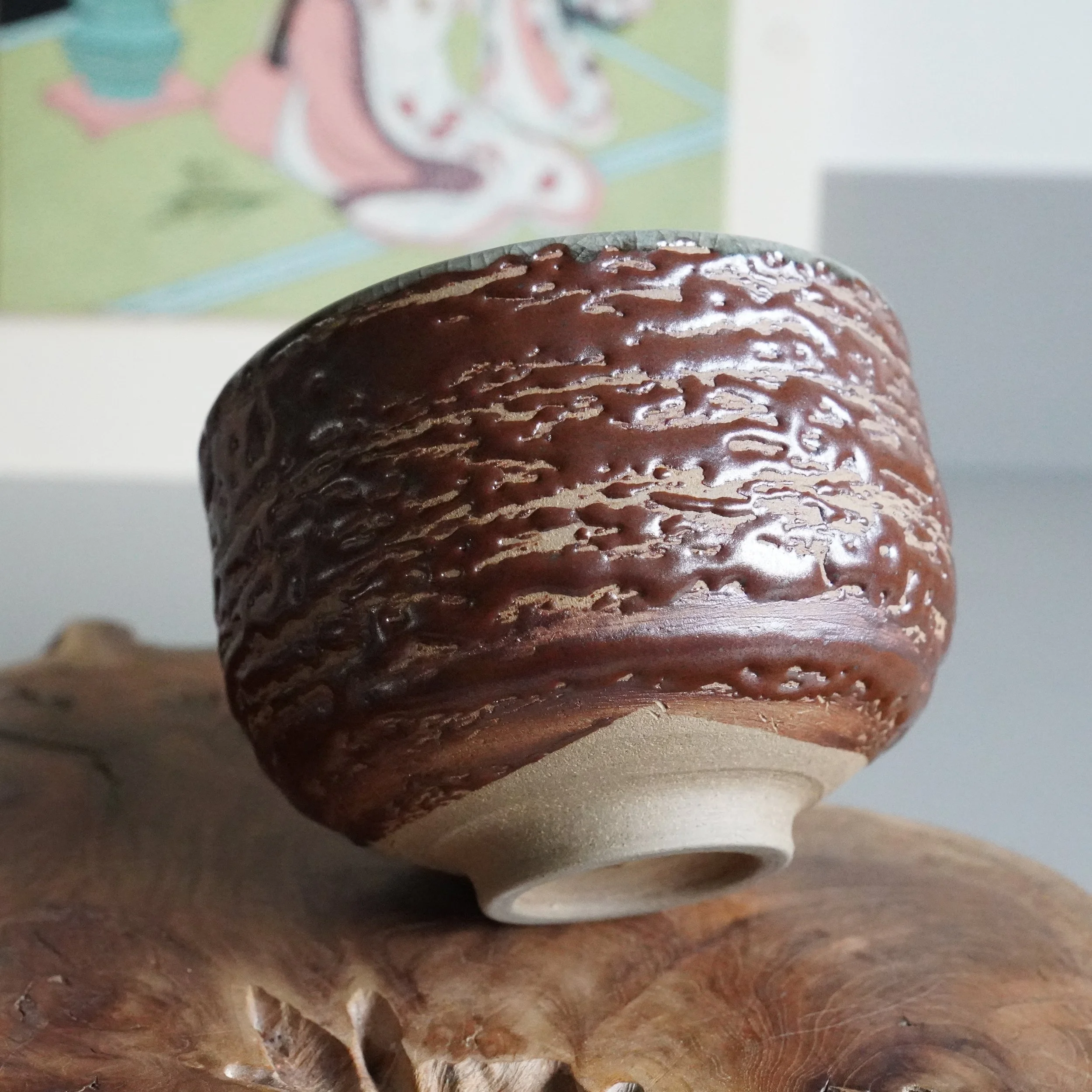 Side view of matsukawa-yaki chawan, uneven brown bark-textured glaze by Kujiro, Inuyama ware