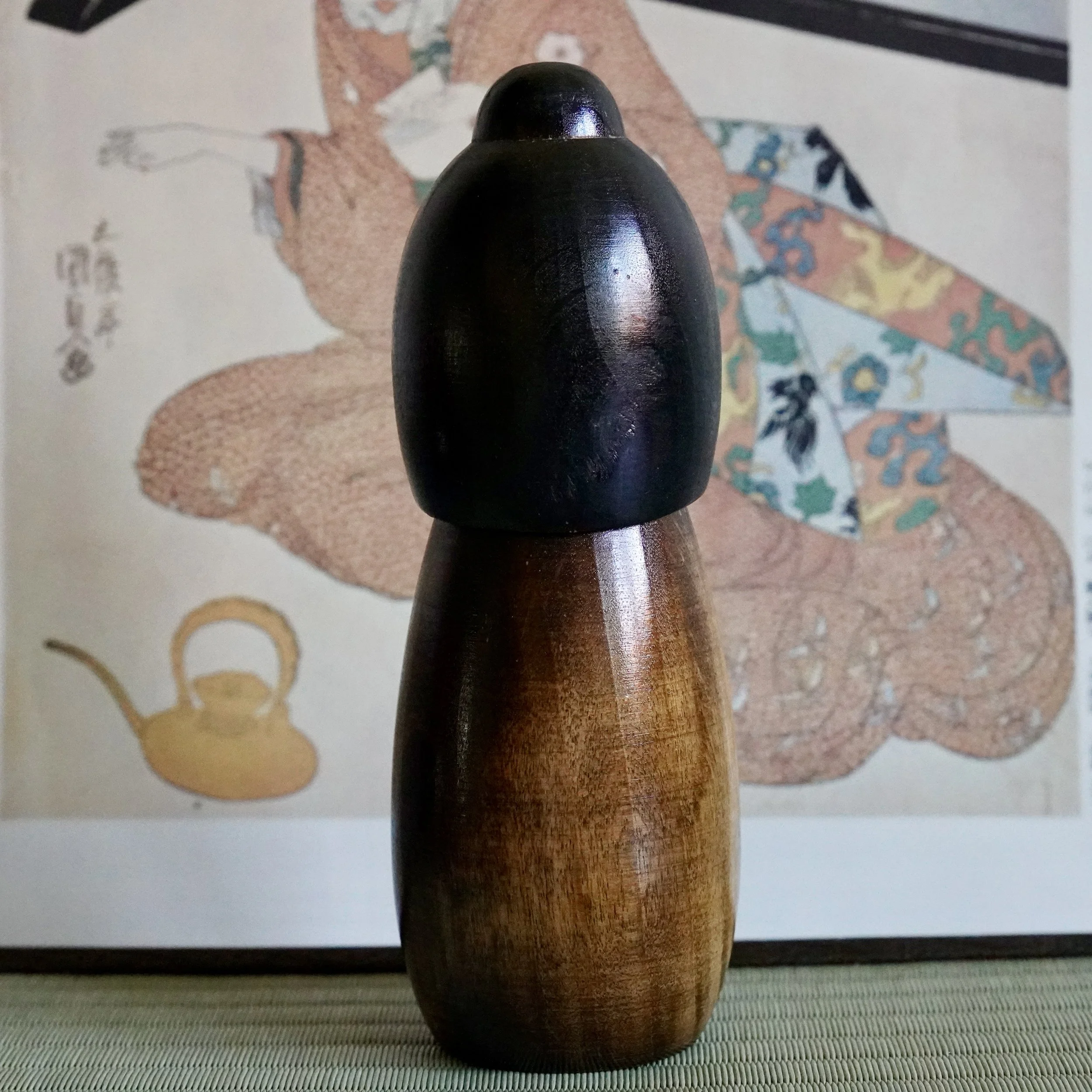 Rear view of Takeda Masashi kokeshi, plain lacquered back