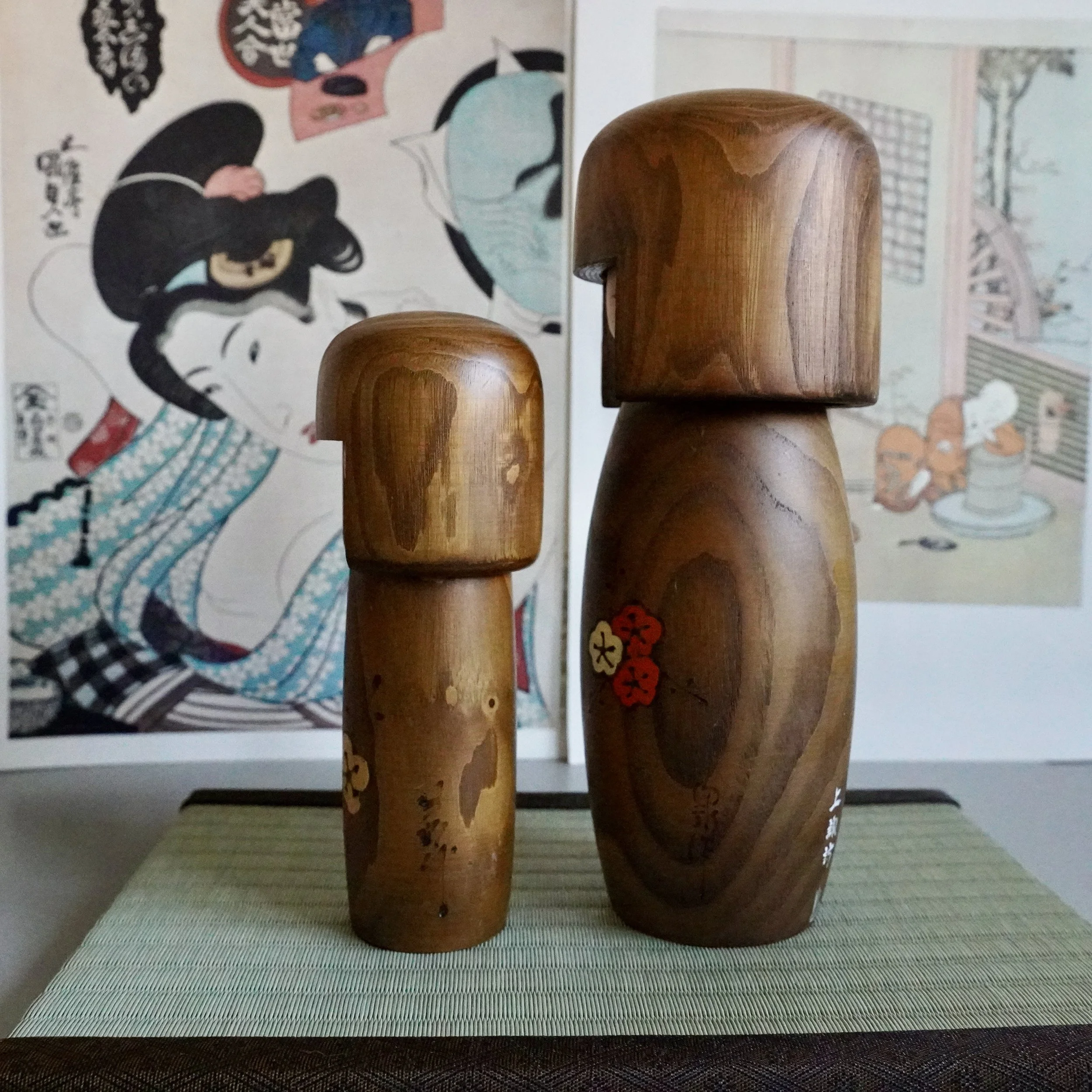 Usaburo kokeshi pair natural wood hair ume plum blossom side angle detail