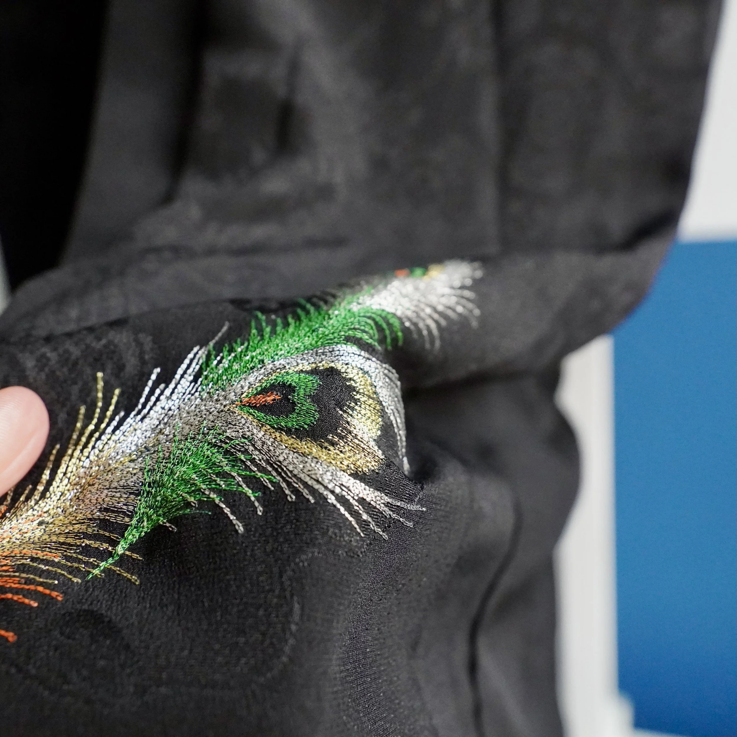 Japanese black silk haori peacock feather embroidery kamon Showa close up