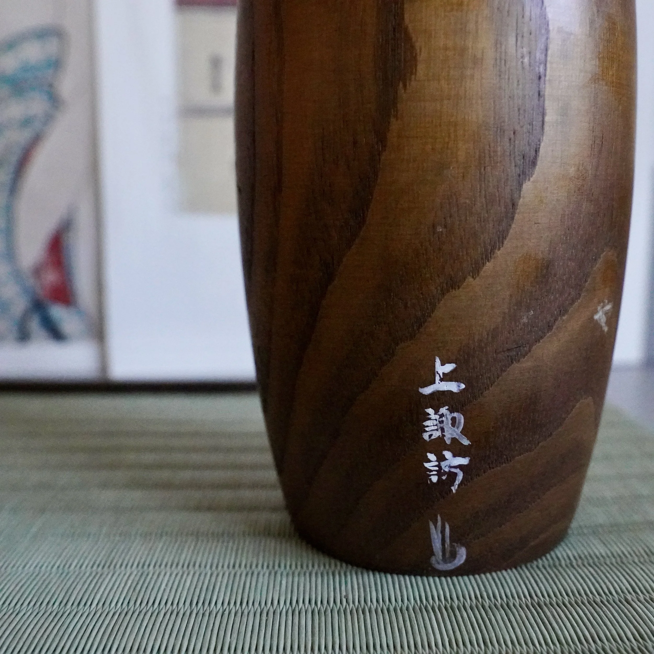 Usaburo kokeshi pair natural wood hair Kamisuwa onsen inscription visible on base