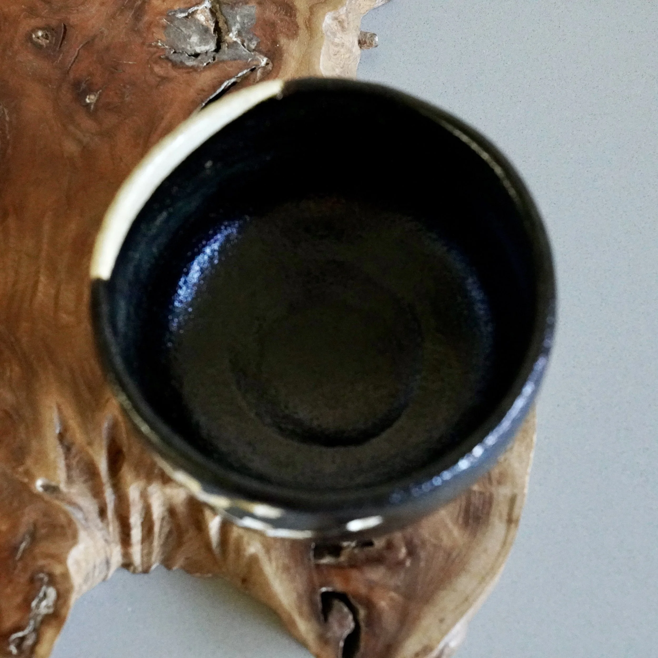 Interior of kuro chawan, black glaze, matcha bowl inside view