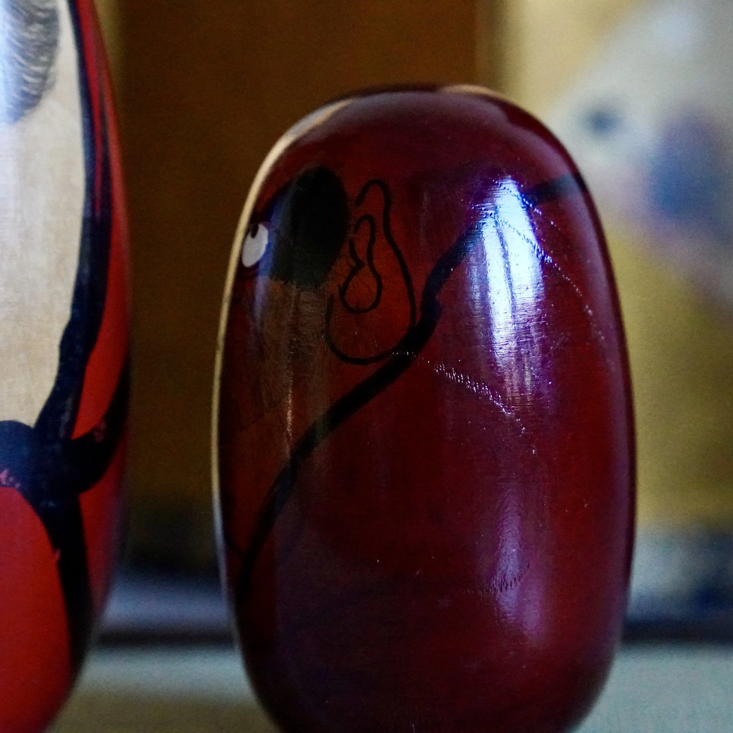 Vintage daruma side profile attributed to Seifu Gono, Shōwa period, oxblood wood