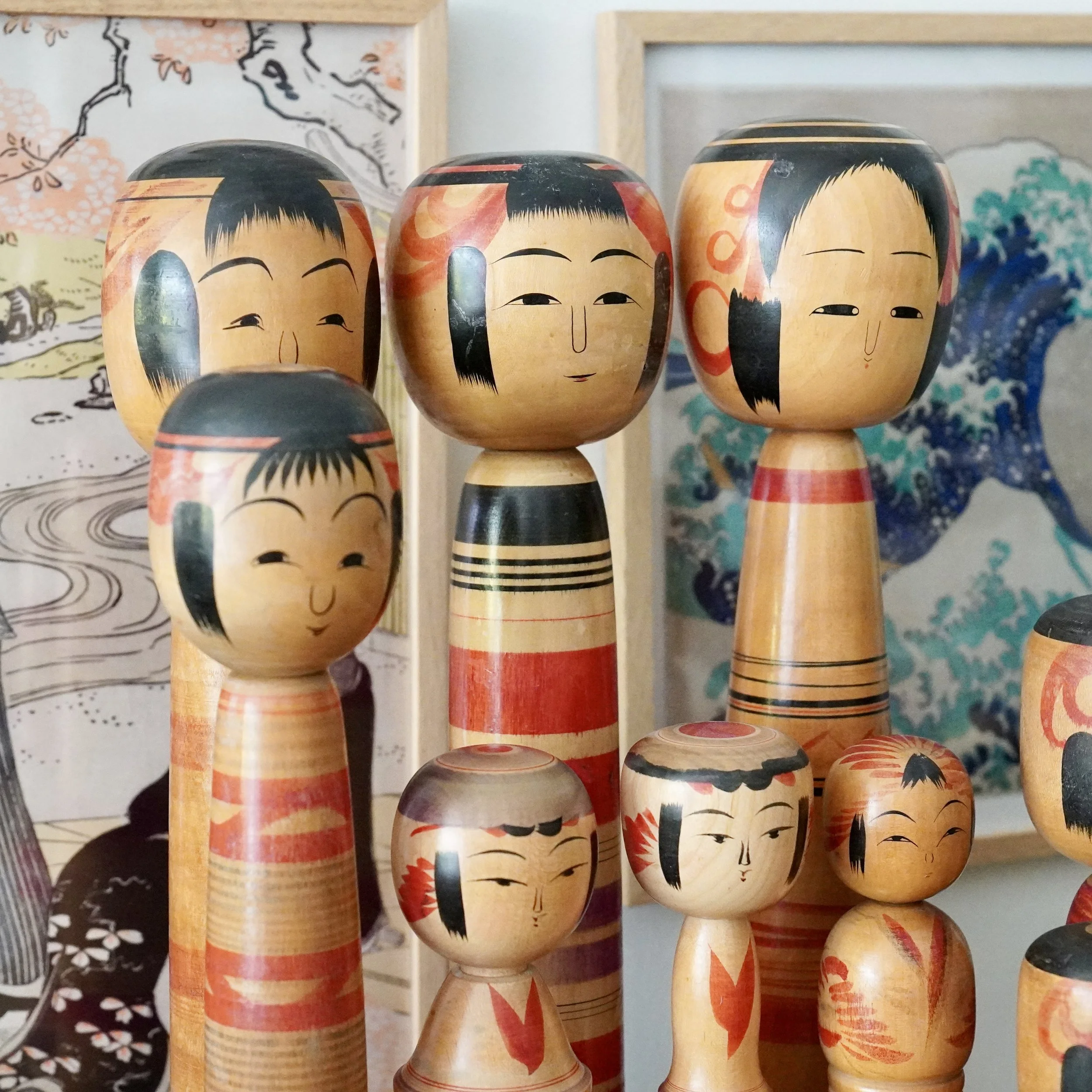 Group of vintage Tsuchiyu kokeshi dolls, including pieces by Abe Ichiro and Abe Kazue