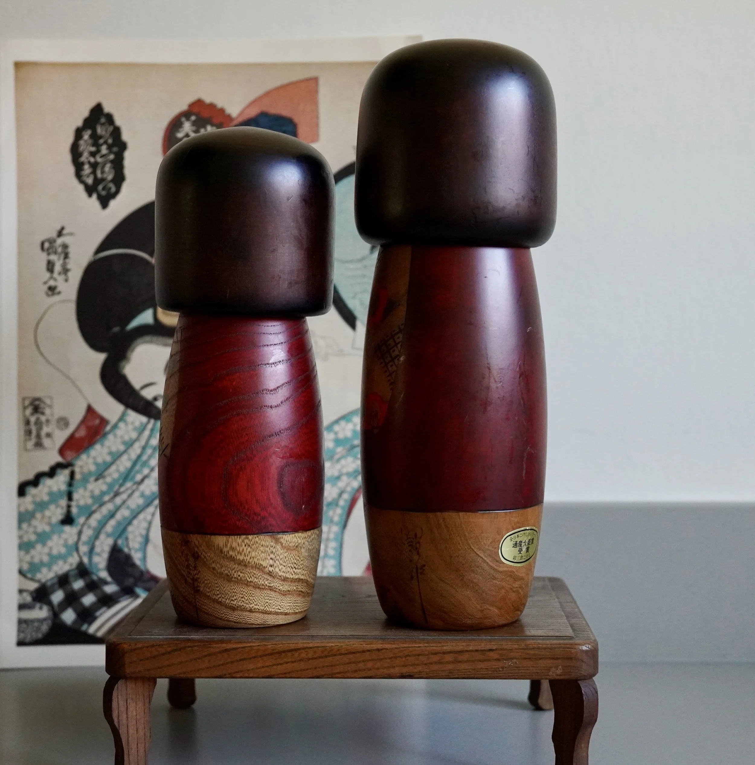 Usaburo sosaku kokeshi pair base view studio seal zelkova Showa