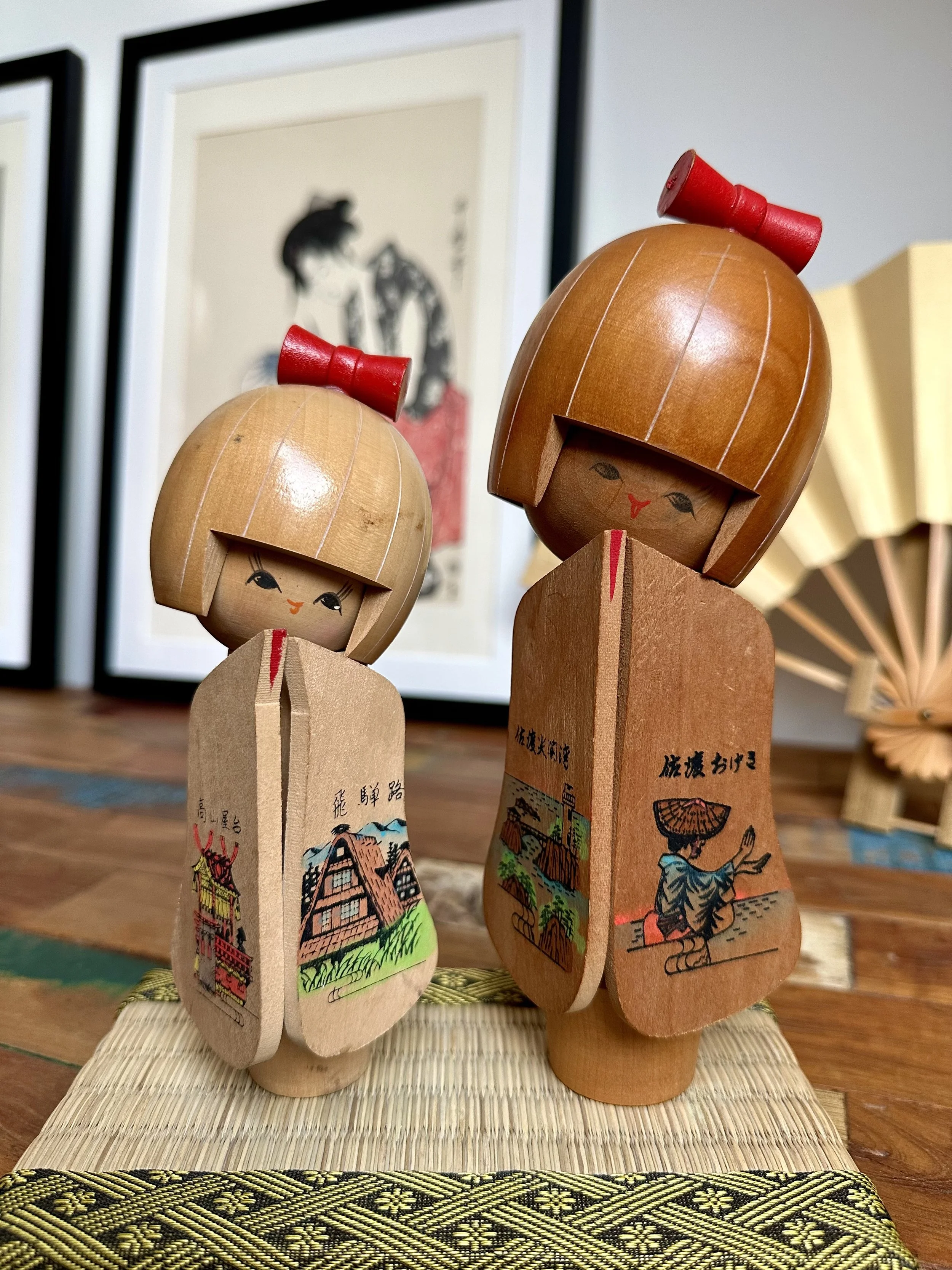 Pair of omiyage kokeshi with folding panels, Sado Island and Hida region, signed by Sato Suigai, Shōwa period