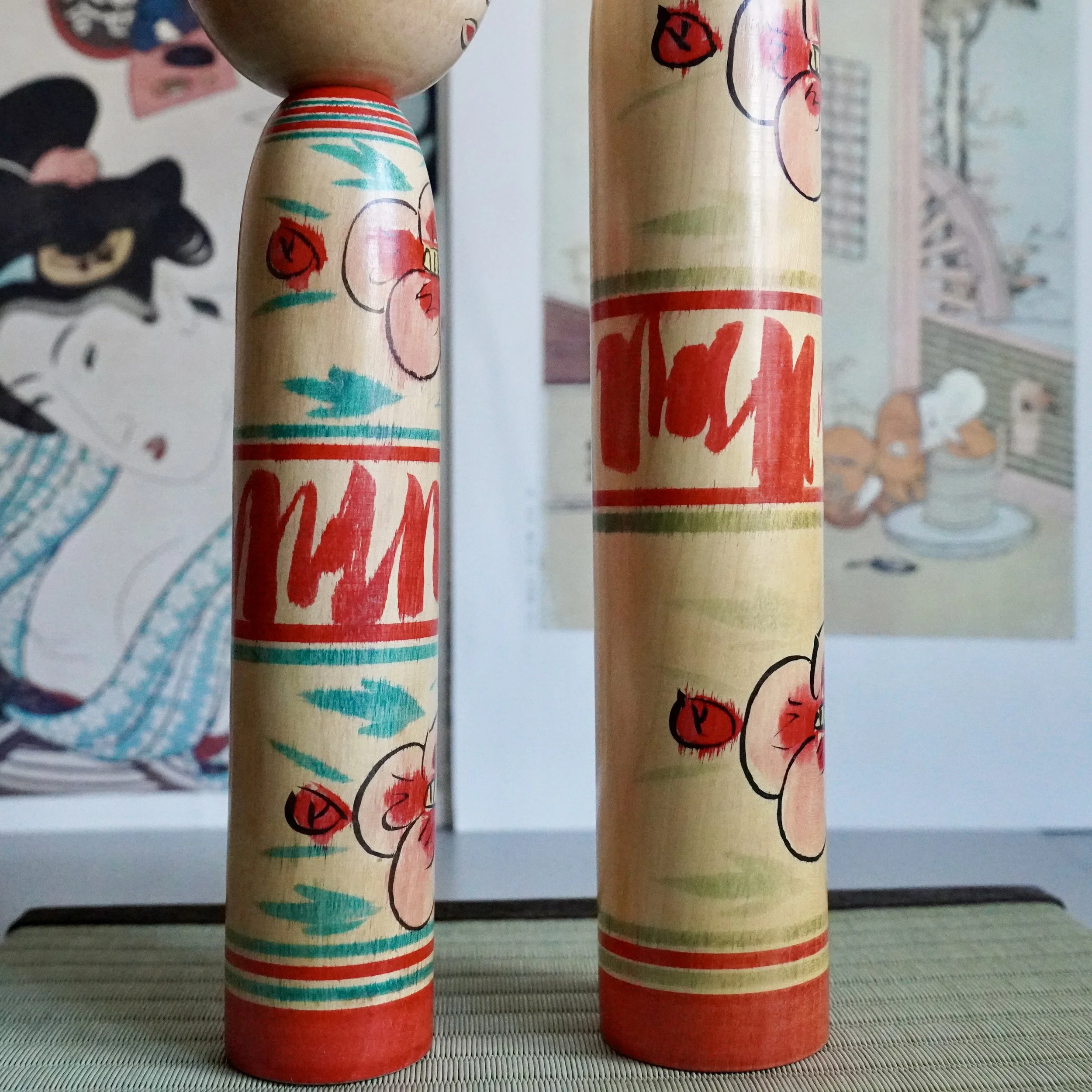 Nakanosawa Takobozu kokeshi bodies, hand painted peony motifs and banding, signed vintage kokeshi by Saito Tokuju