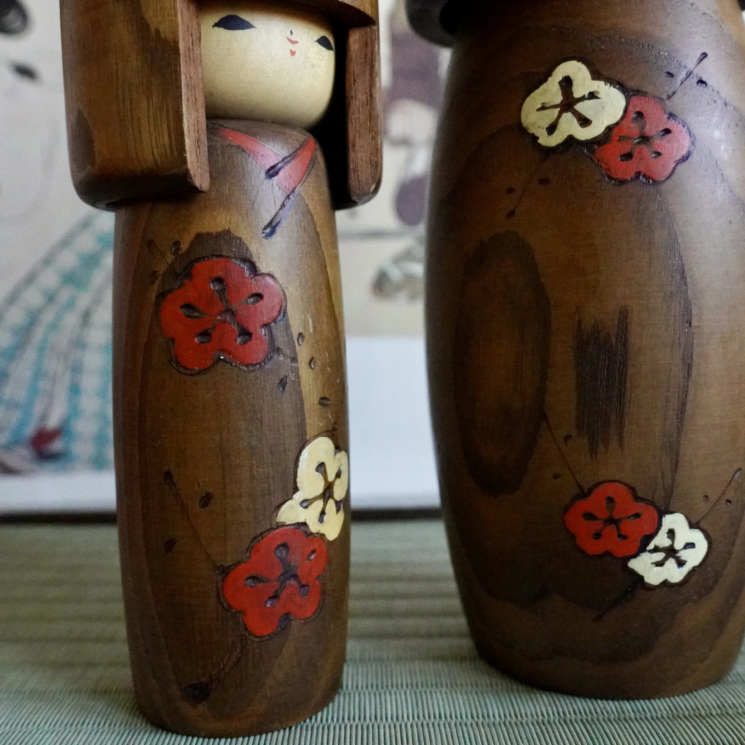 Usaburo kokeshi pair natural wood detail