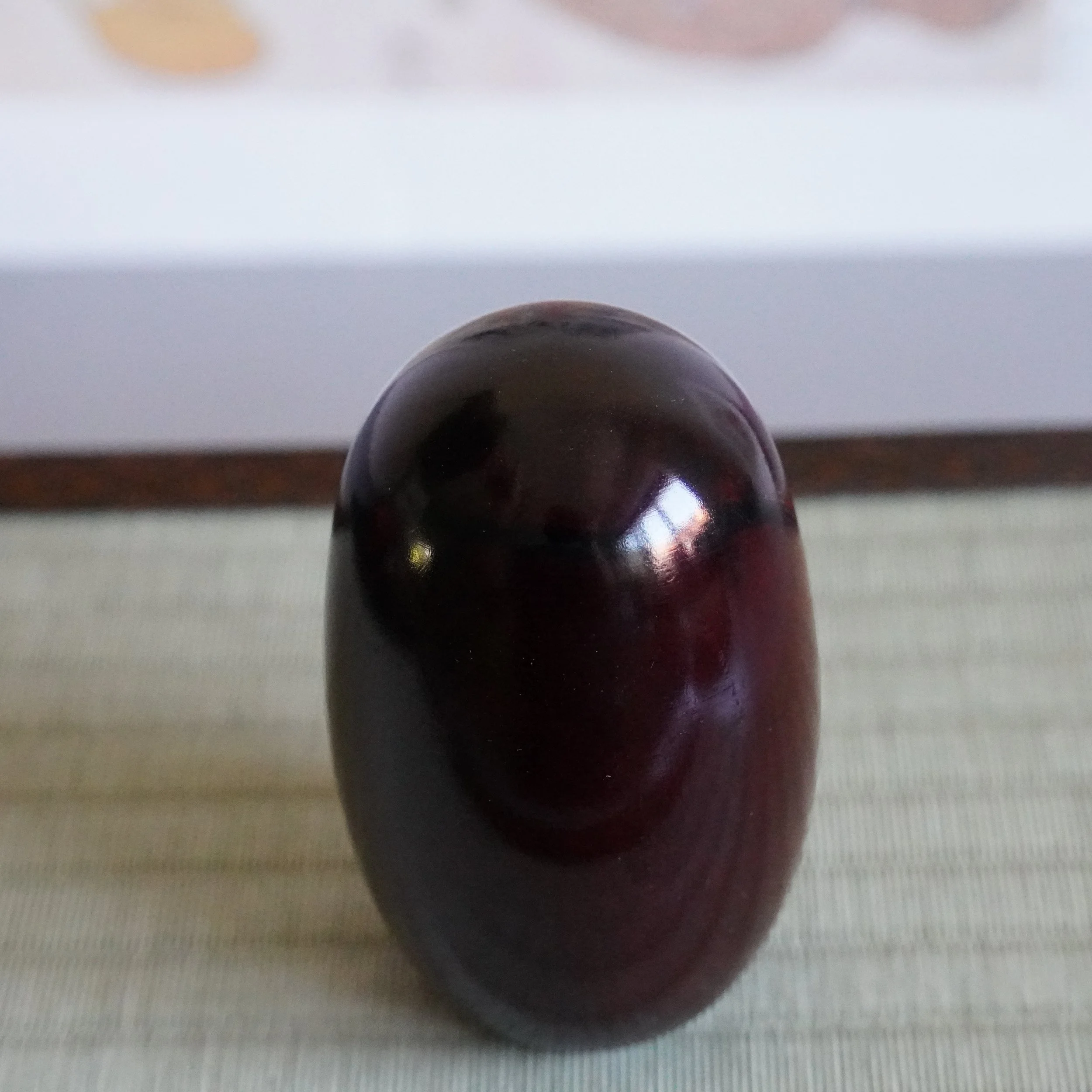 Deep lacquered keyaki wood back of a Daruma Daishi by Seifu Gono, vintage Japanese mingei craft