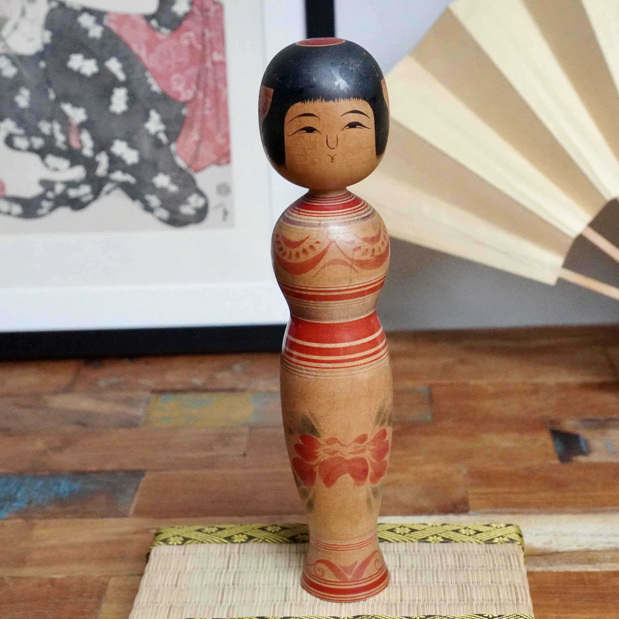 Tsugaru kokeshi with peony motif, signed by Sasamori Junichi, Shōwa period