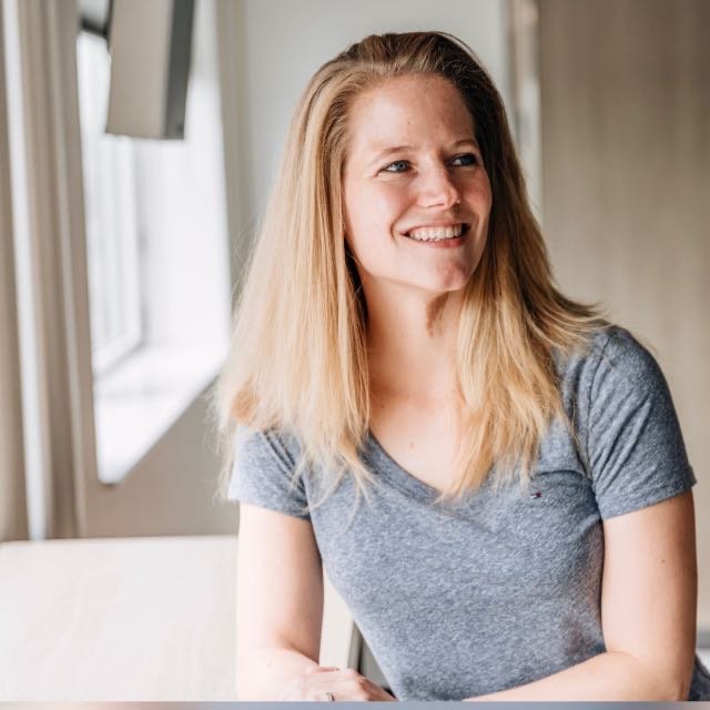A portrait of Hannah, the founder of kaikoandco shop, smiling in a bright room. She is a specialist who personally sources authentic vintage items from Japan.