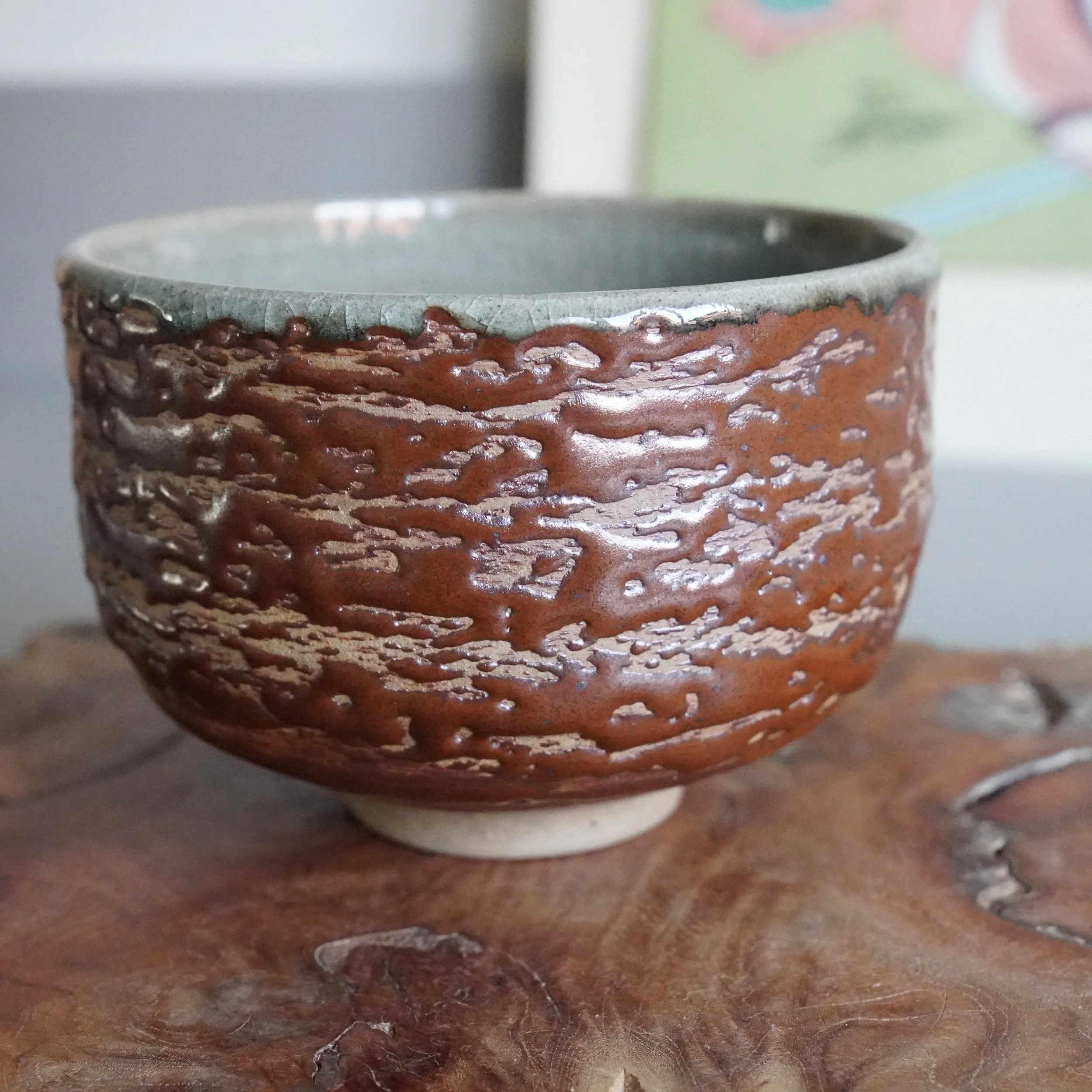 Matsukawa-gama chawan, brown bark-textured glaze exterior, Japanese tea ceremony bowl on wood stand