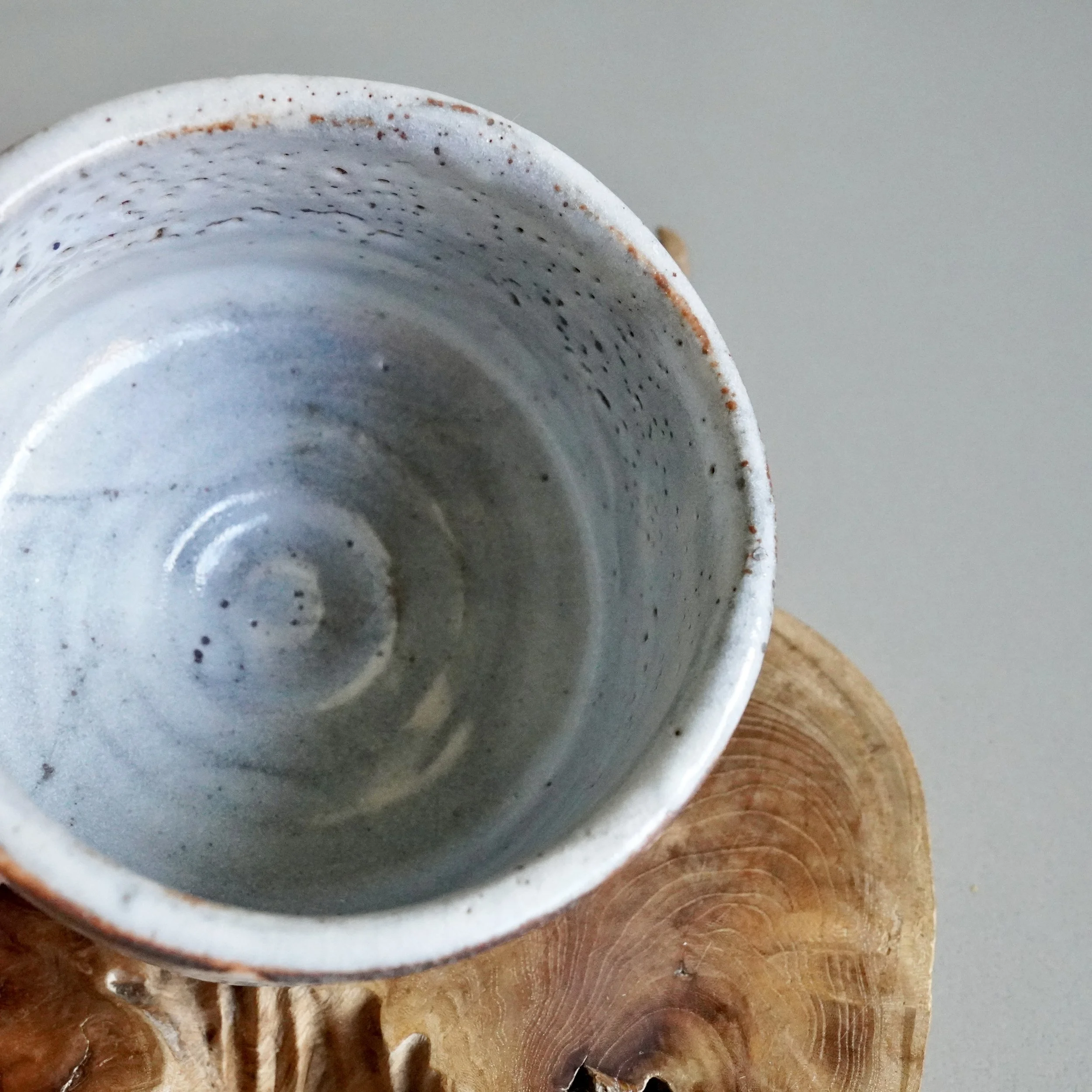 Shino chawan interior overhead, glaze pooling and throwing lines