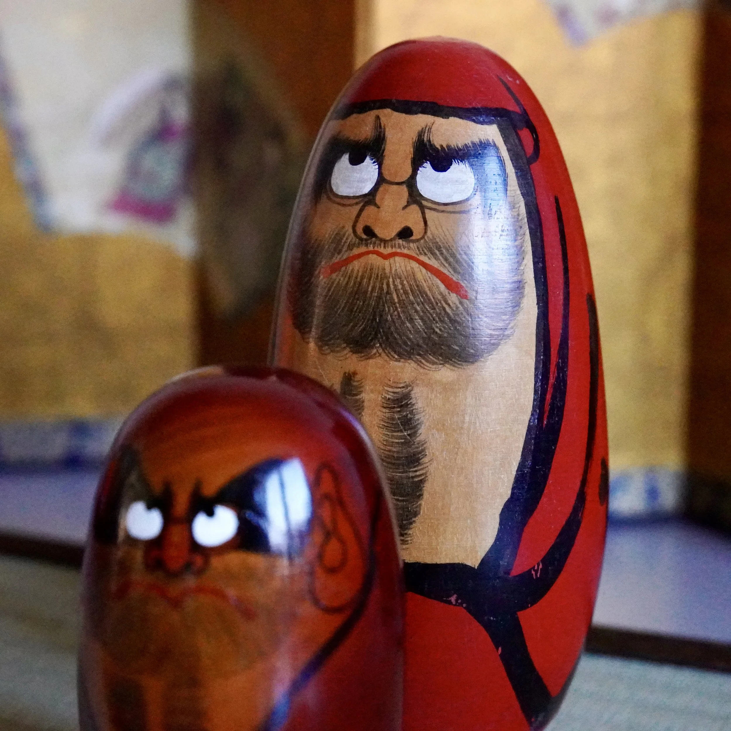 Vintage daruma face by Shido Shozan, Shōwa period, vermilion lacquer close-up