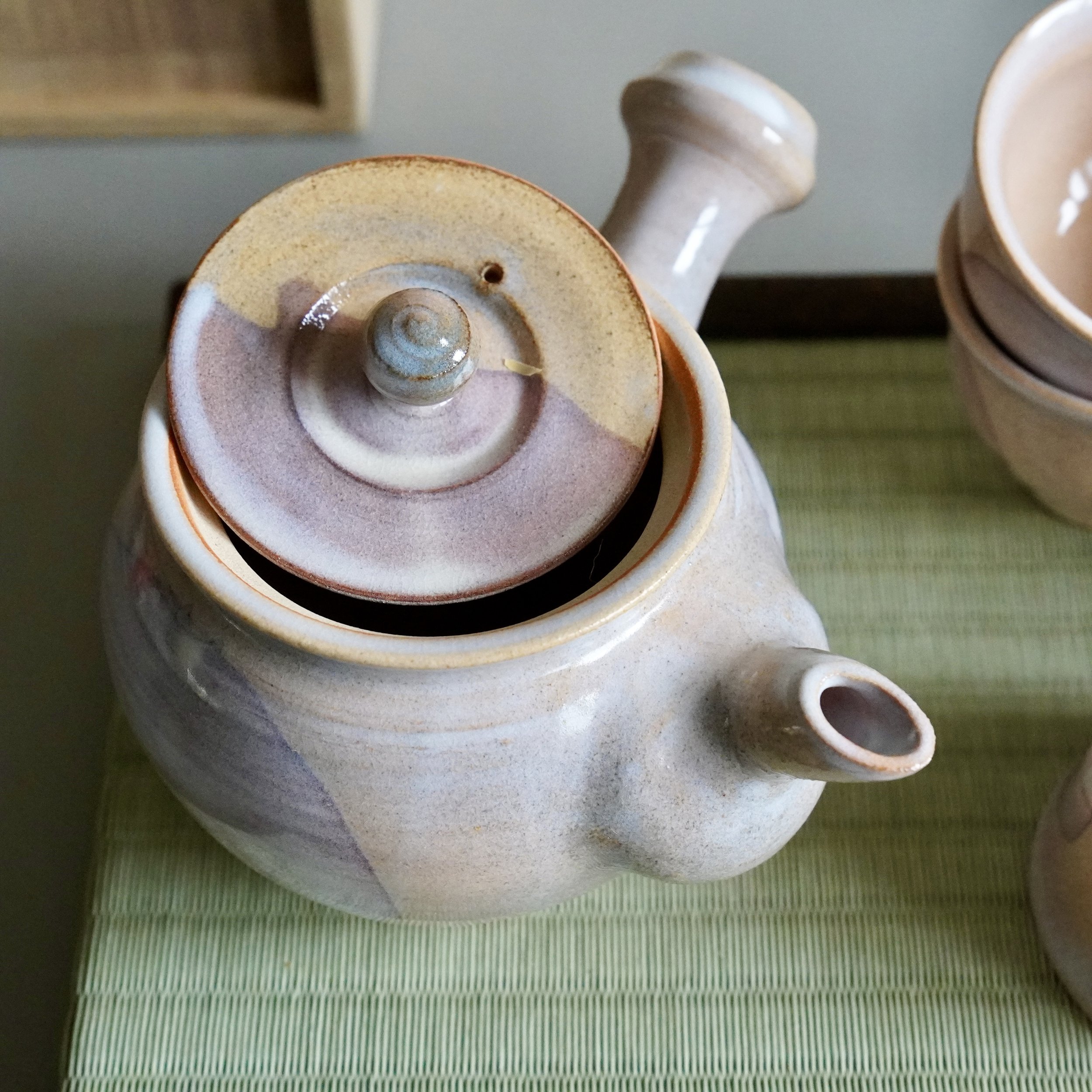 Hagi-yaki kyusu overhead view showing lid and ceramic spout strainer