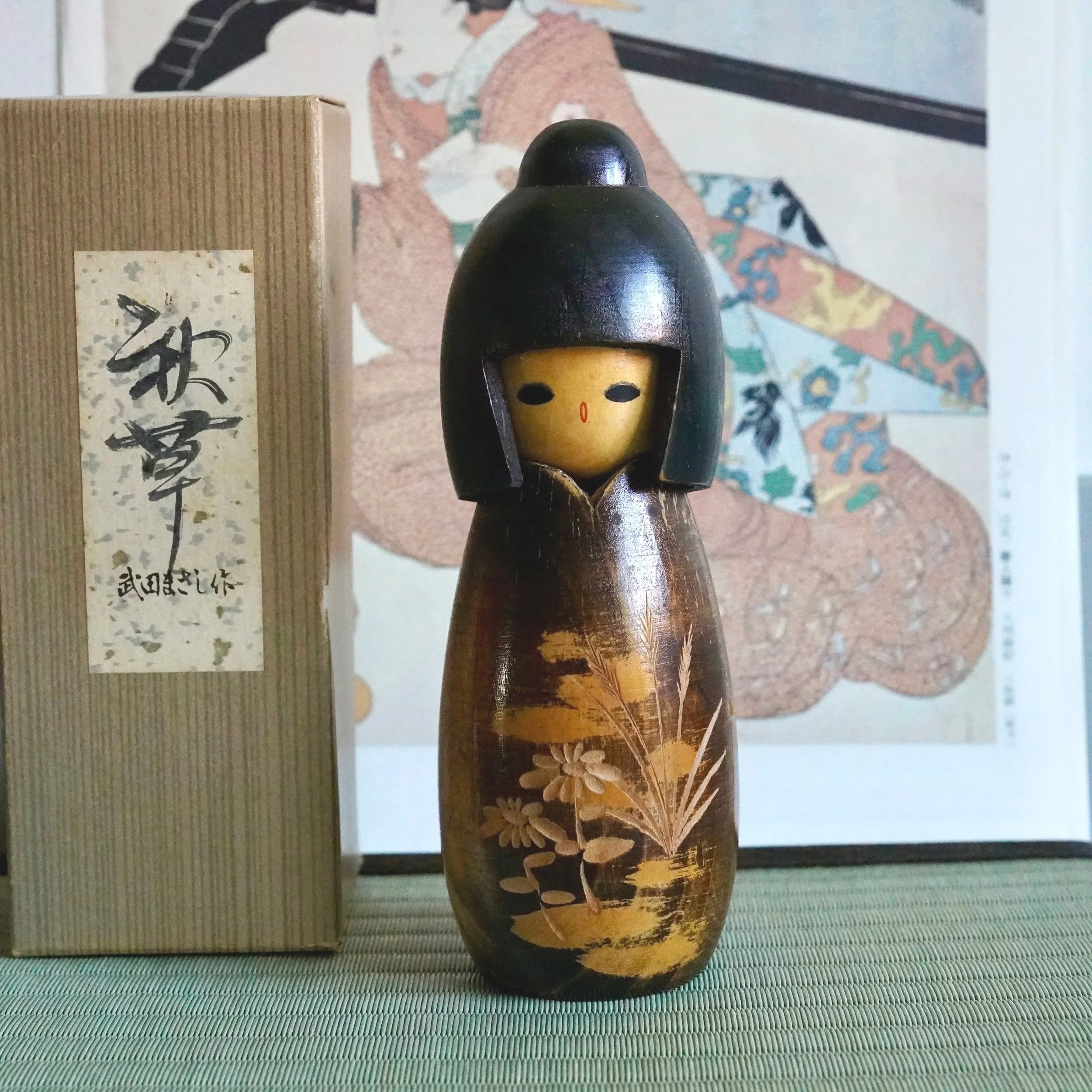 Sōsaku kokeshi by Takeda Masashi with original tomobako, carved autumn grasses