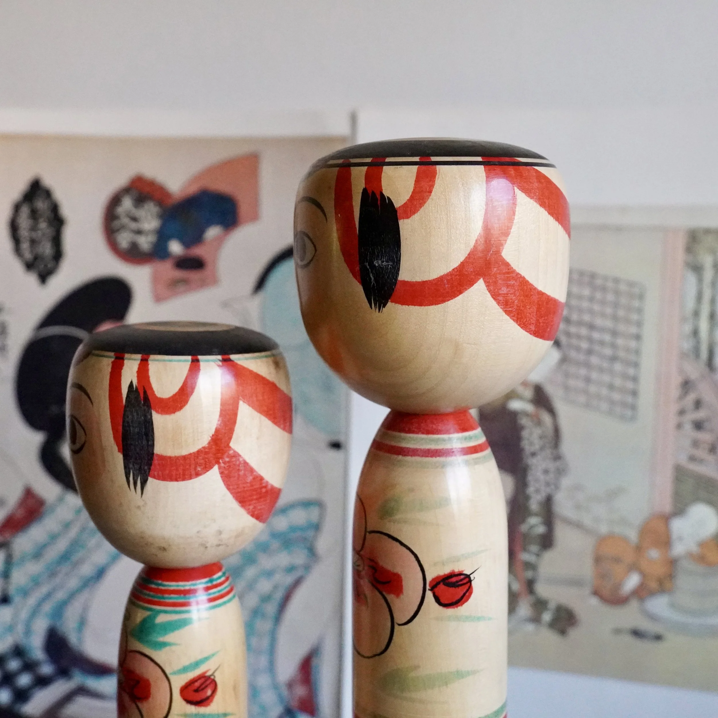 Nakanosawa Takobozu kokeshi heads side by side, hand painted facial detail, signed vintage kokeshi by Saito Tokuju