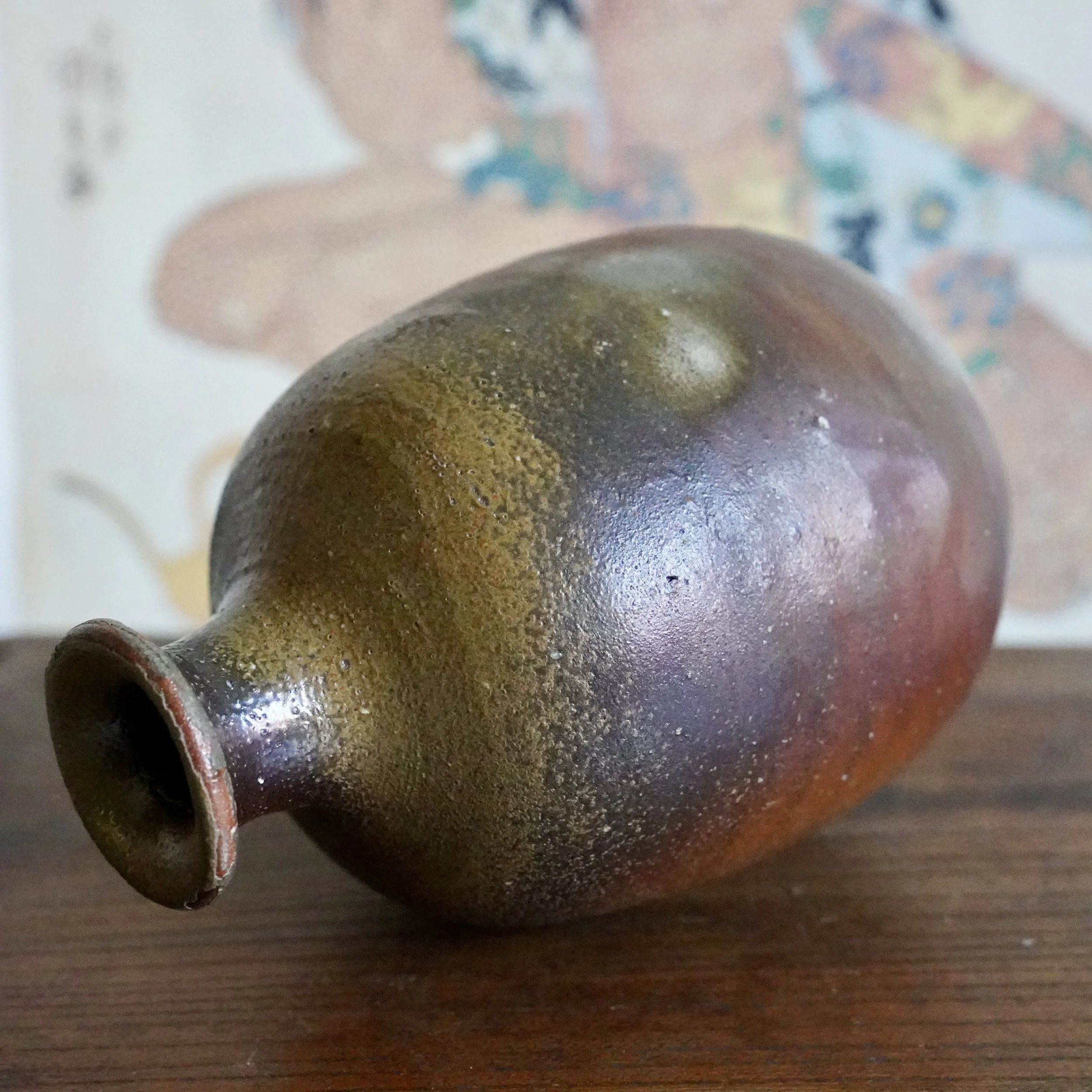 Bizen-yaki sake bottle by Isezaki Sō, angled view showing the flared neck