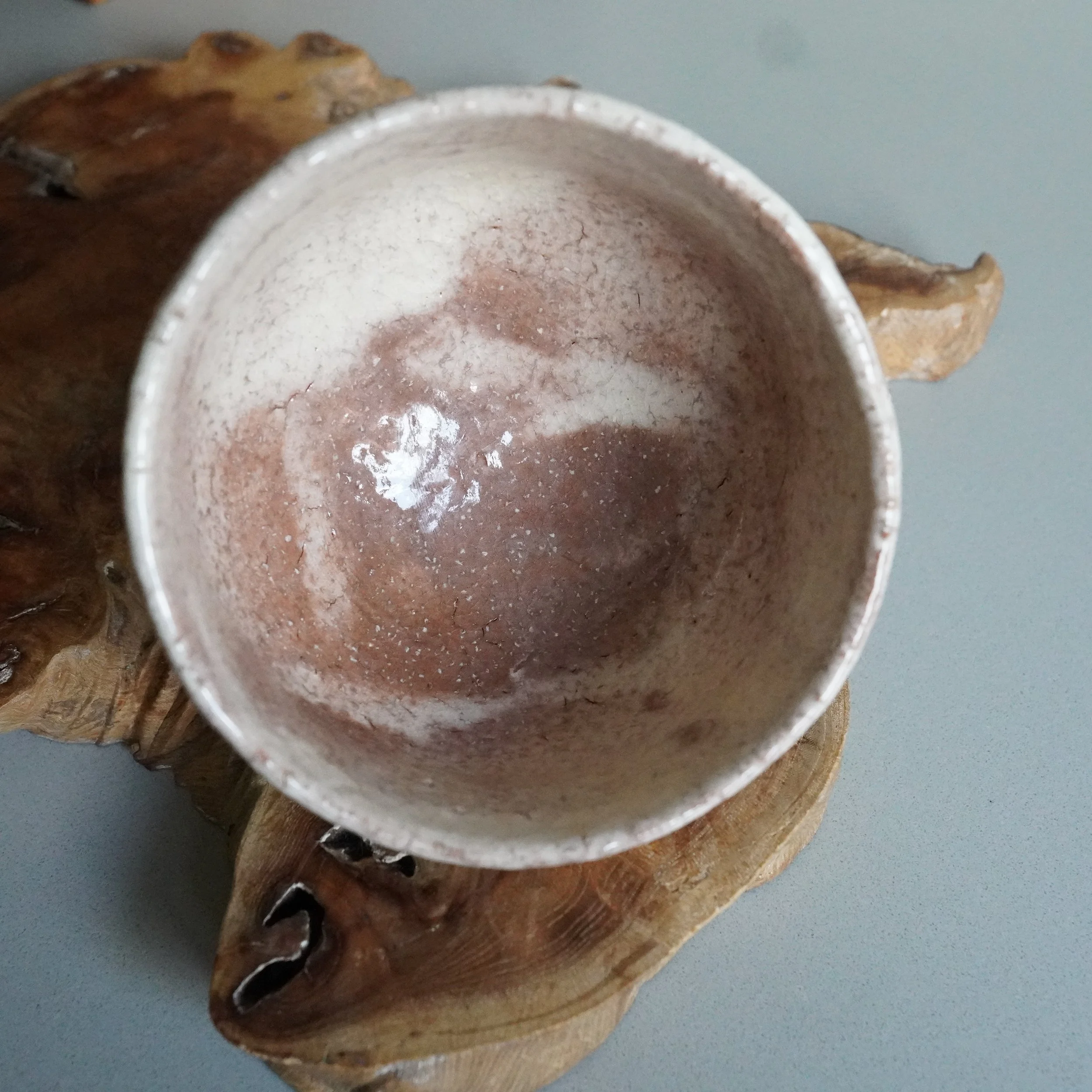 Full inside view Oni-Hagi chawan Tenpōzan kiln, pale glaze with craquelé