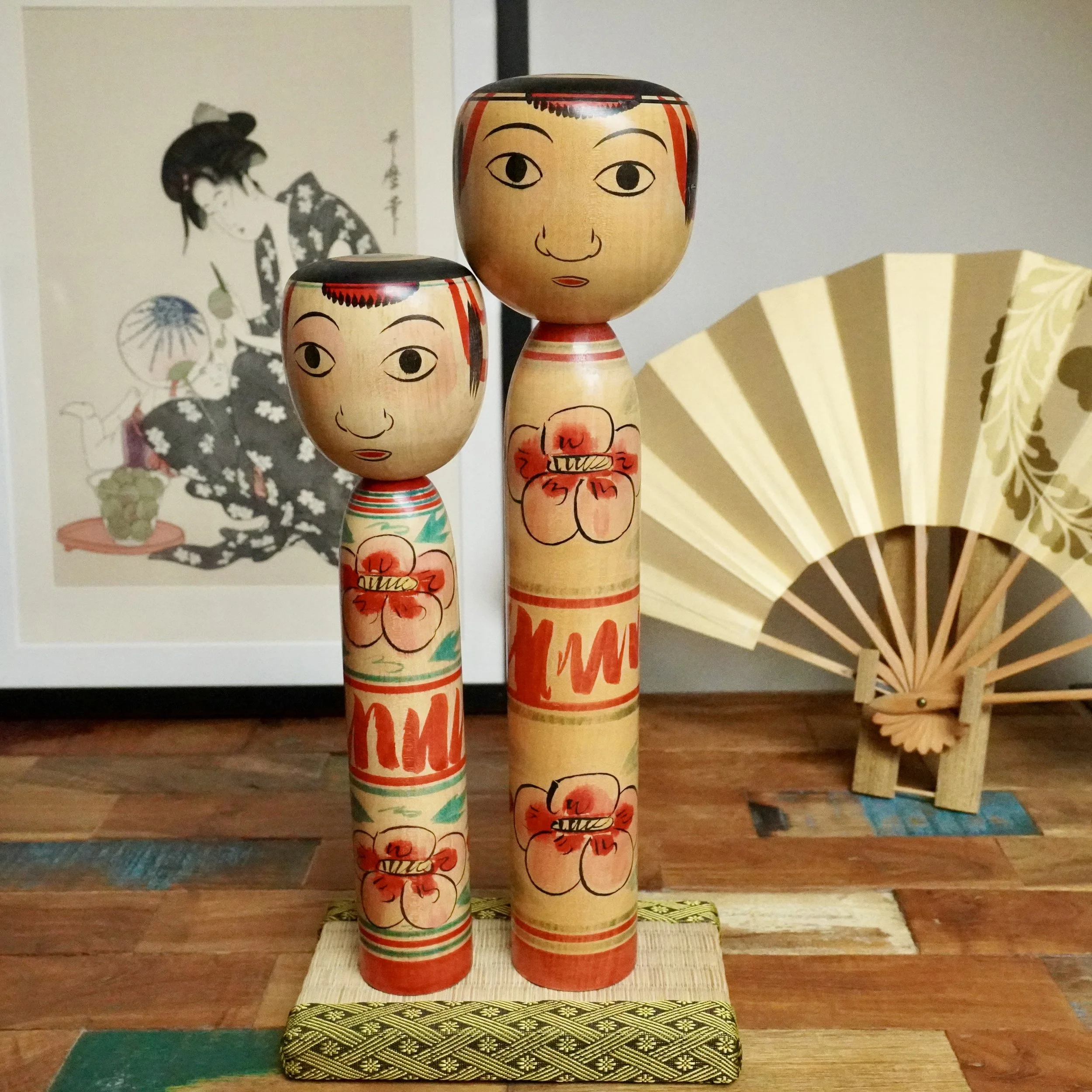 Pair of Tsuchiyu Nakanosawa Takobozu kokeshi signed by Saito Tokuju, Shōwa period