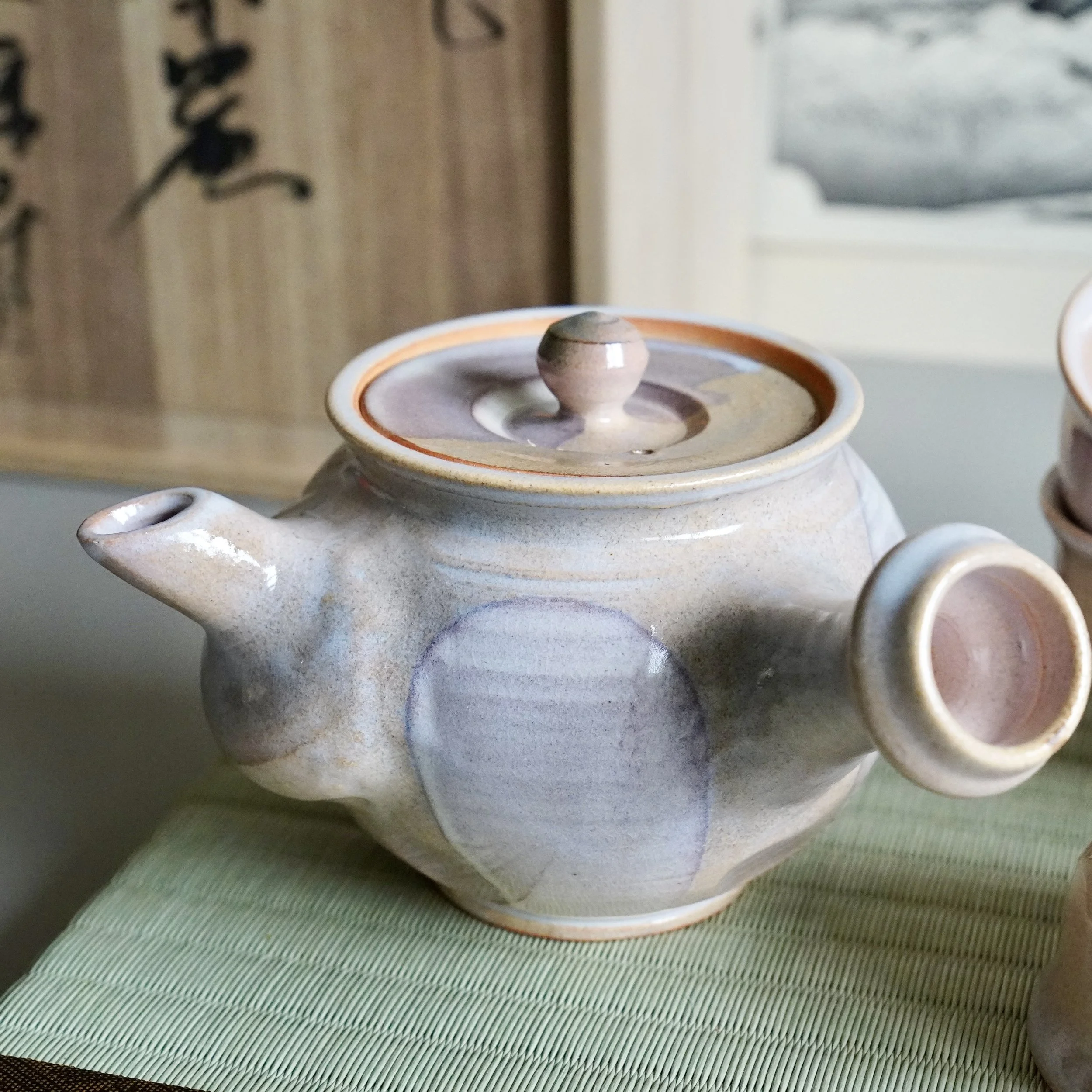 6. Hagi-yaki kyusu angled view showing spout and glaze gradient