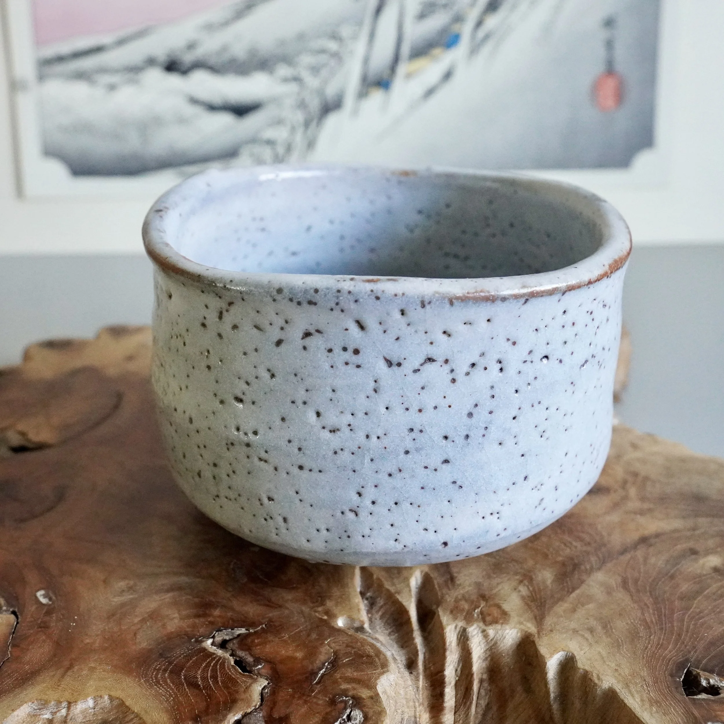 Shino-yaki chawan side angle, iron speckled glaze, carved exterior