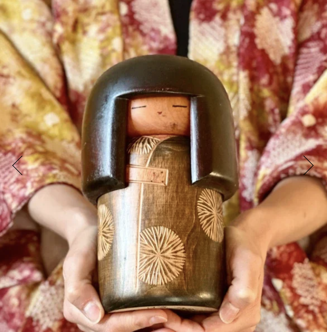 Sekiguchi Sansaku dōjo kokeshi carved chrysanthemum kimono, sold