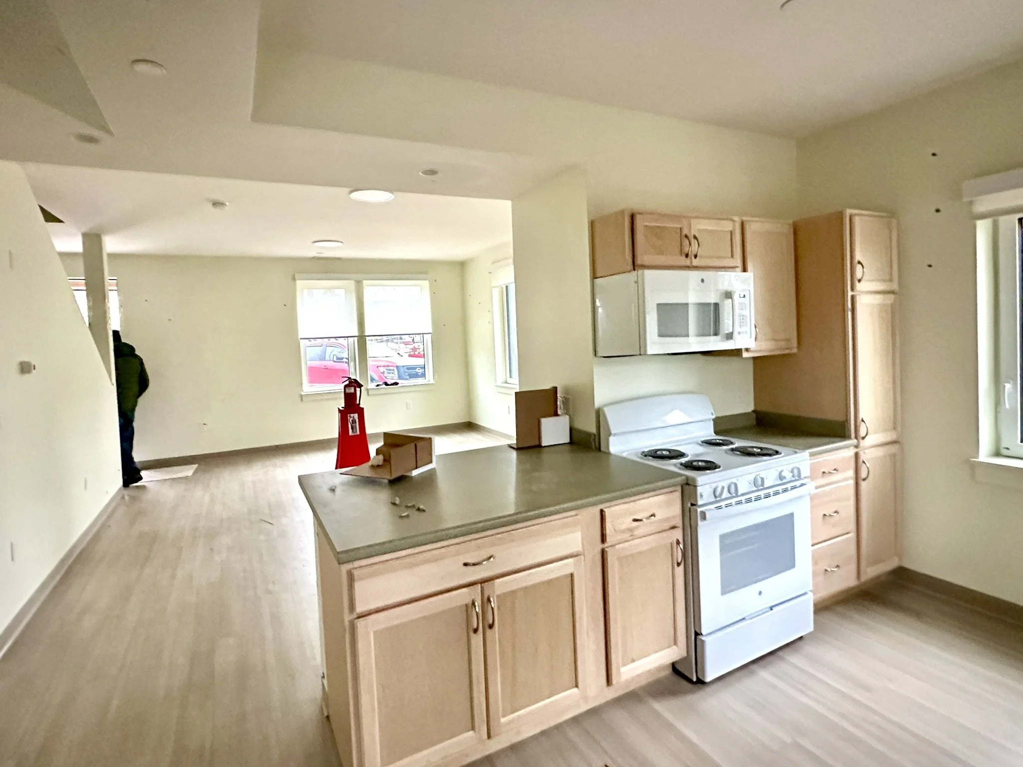 Kitchen and living room of a 2-bedroom Townhouse at Lawrence Hill