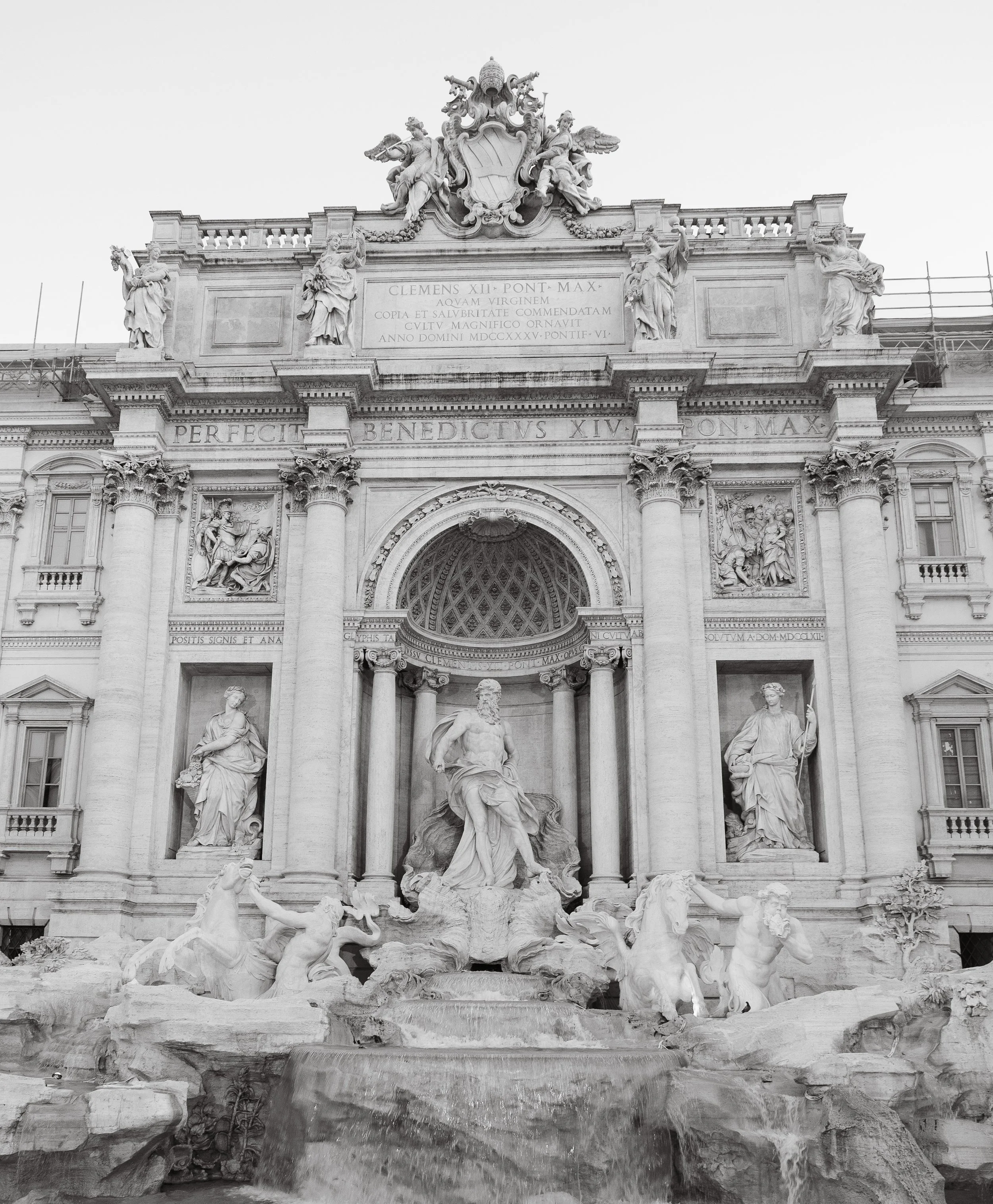 Trevi fountain, fontana di trevi in bianco e nero. Black and white rome place. Iconic fountain.