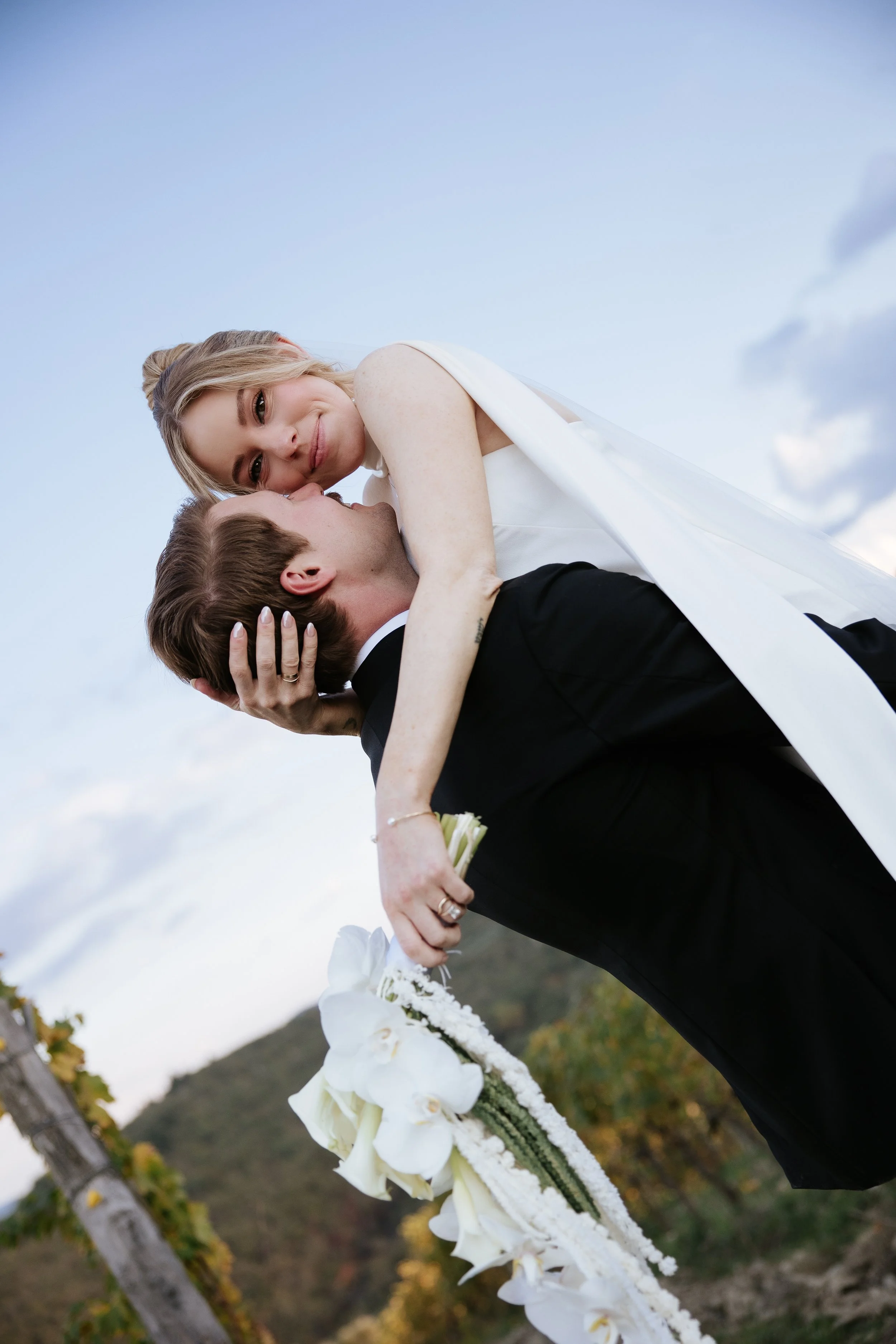 Couple during the wedding photo session at Le Filigare in Tuscany. Film photo 35mm , Tuscany photographer. Candid moments.