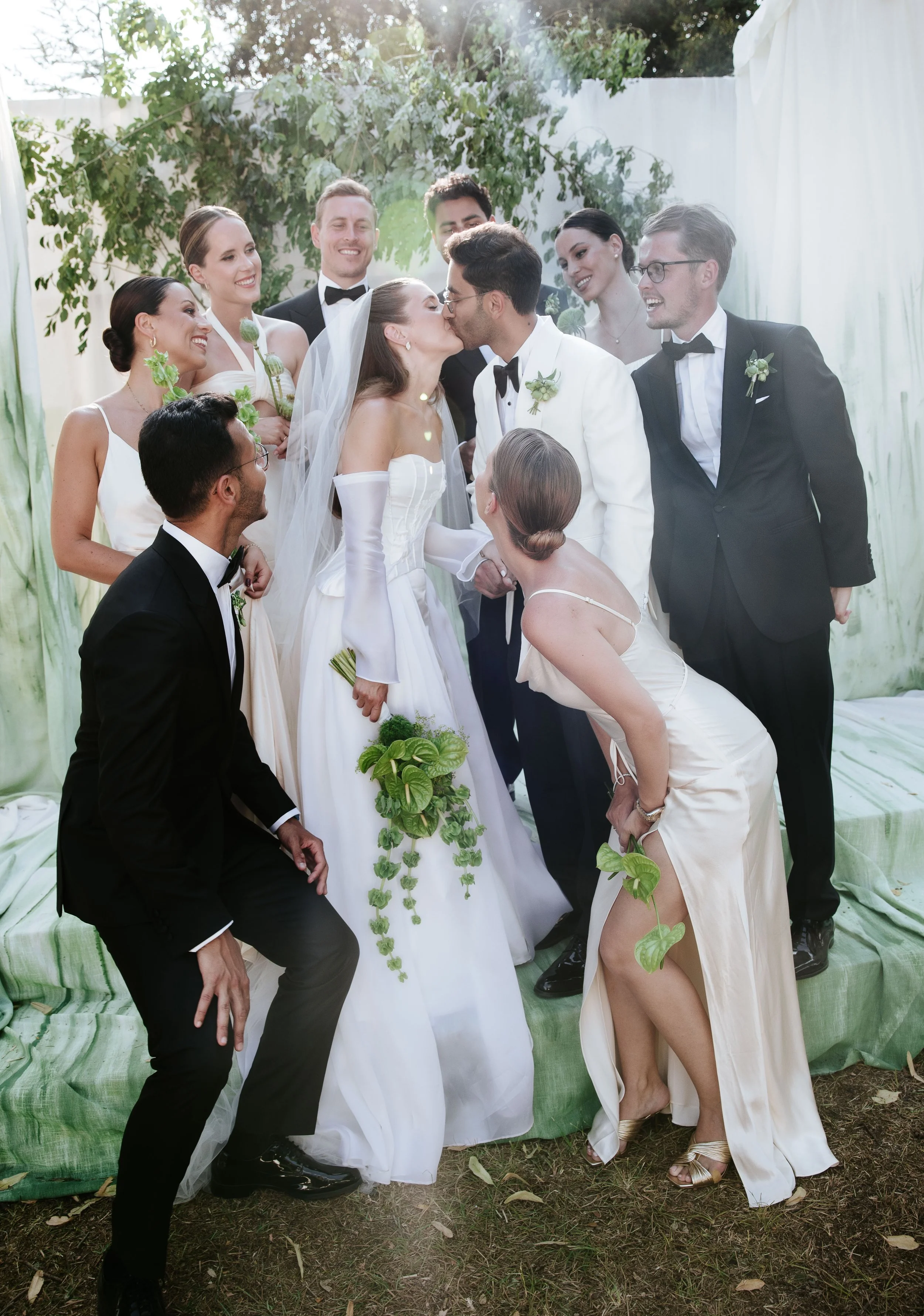 Guests looking bride and groom. Bridemaids and groomsmen enjoy the party in Villa Corsini, Florence.