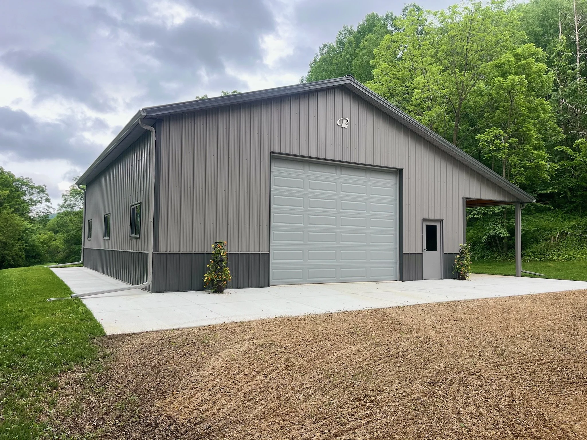 Seamless gutter system installed on pole barn