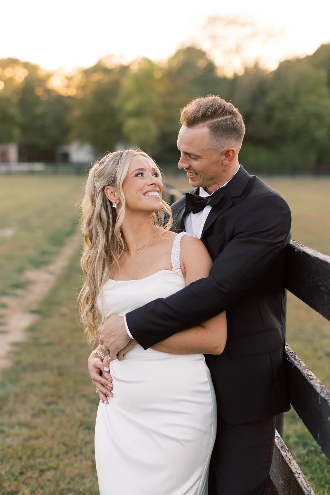 bride and groom fence.jpg