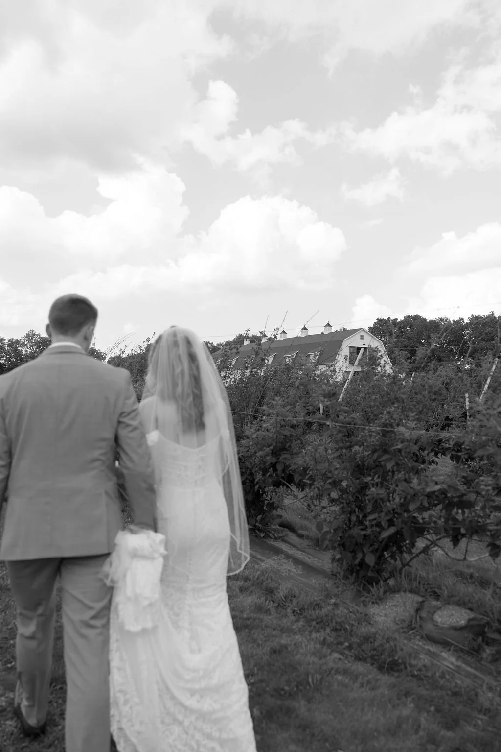 _bride and groom barn background.jpg
