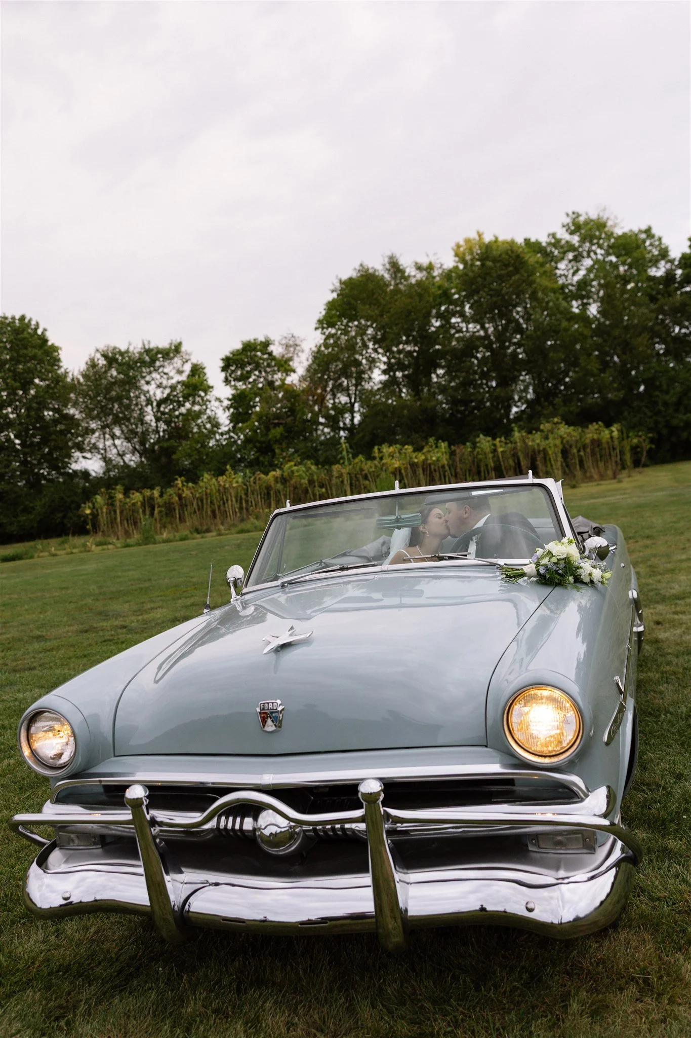 Brucks Blue Car Bride and Groom.jpg