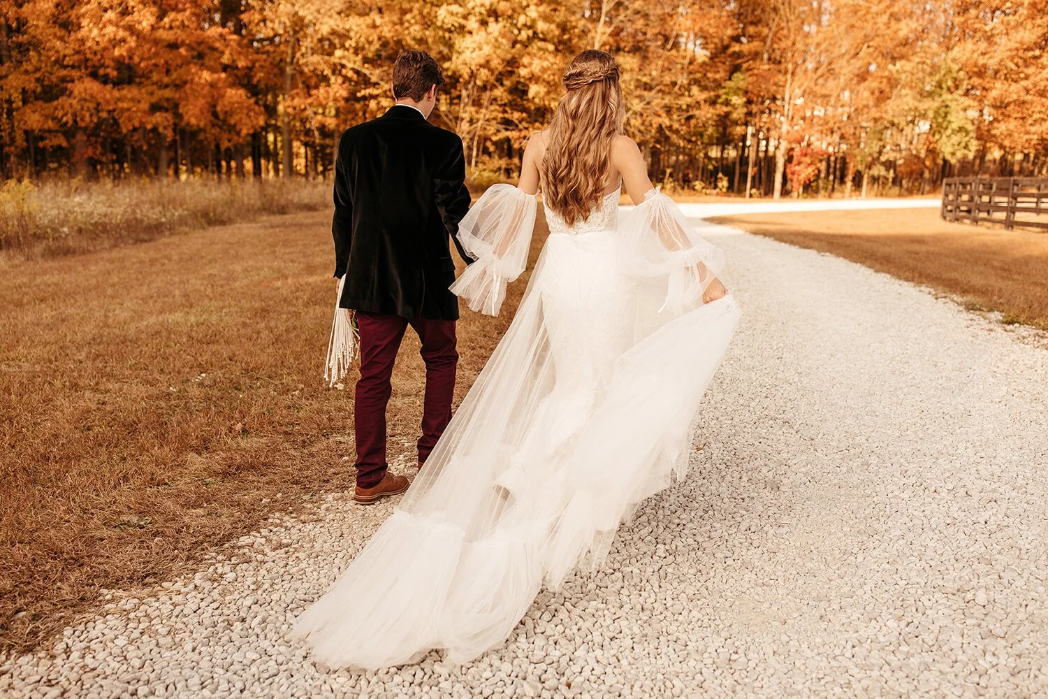 _fall bride walk down lane.jpg