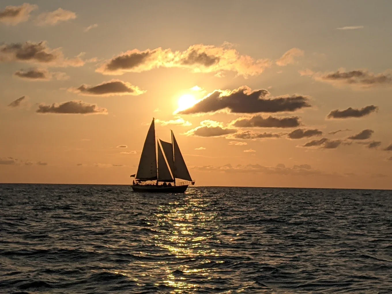 Schooner Clearwater on the horizon of clearwater beach