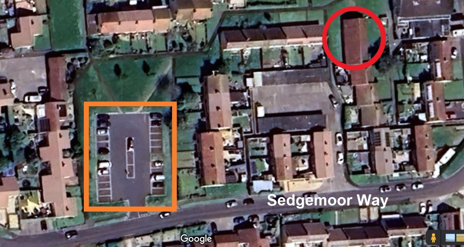 Satellite view of a residential area with buildings, roads, and parking lots. There is a plotted parking lot outlined in orange on the lower left and a red-circled building structure towards the upper right. Street name 'Sedgemoor Way' is visible at 