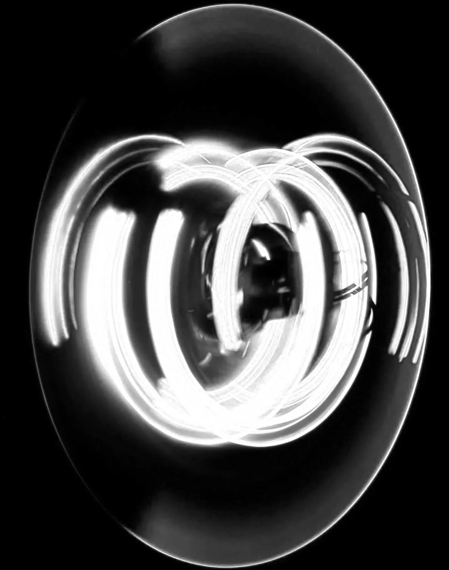 Abstract black and white logo design with intertwined circular lines and a central 'a' shape.